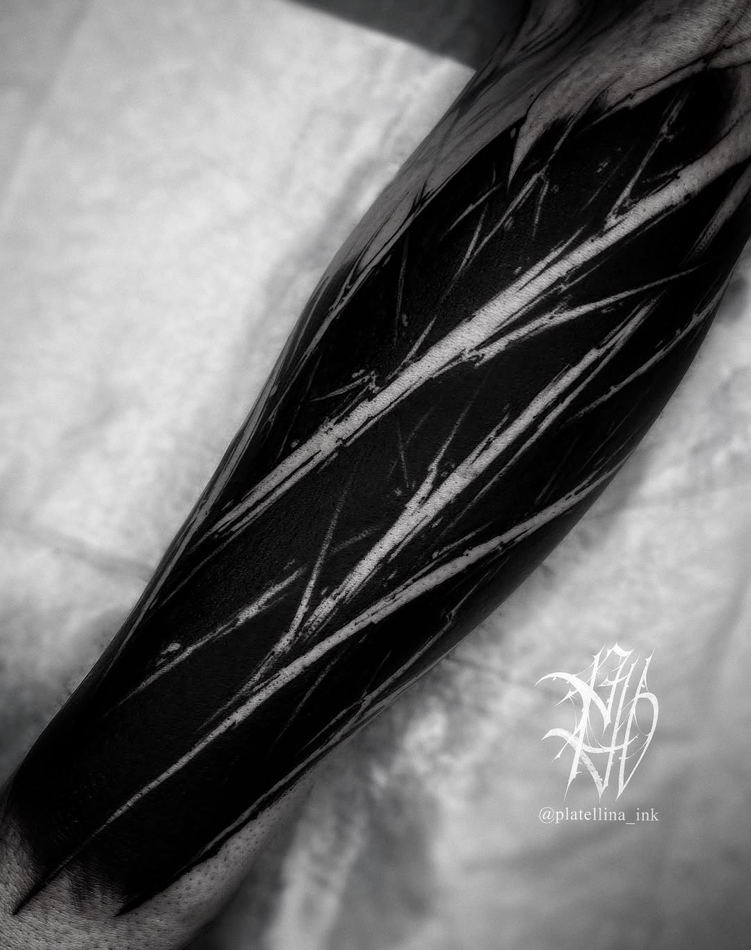 Abstract black and white pattern blackwork tattoo on the forearm by Dark Gothic Tattoo