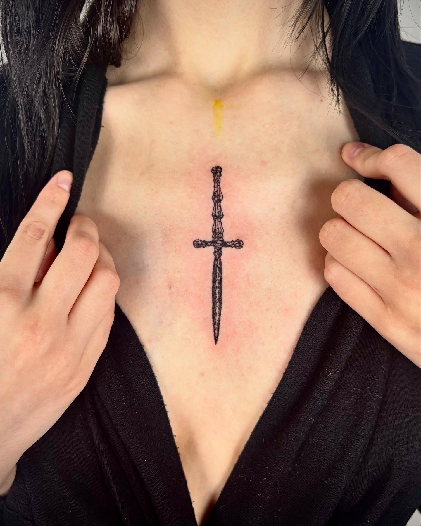 Cross black and grey tattoo on the chest by kendle