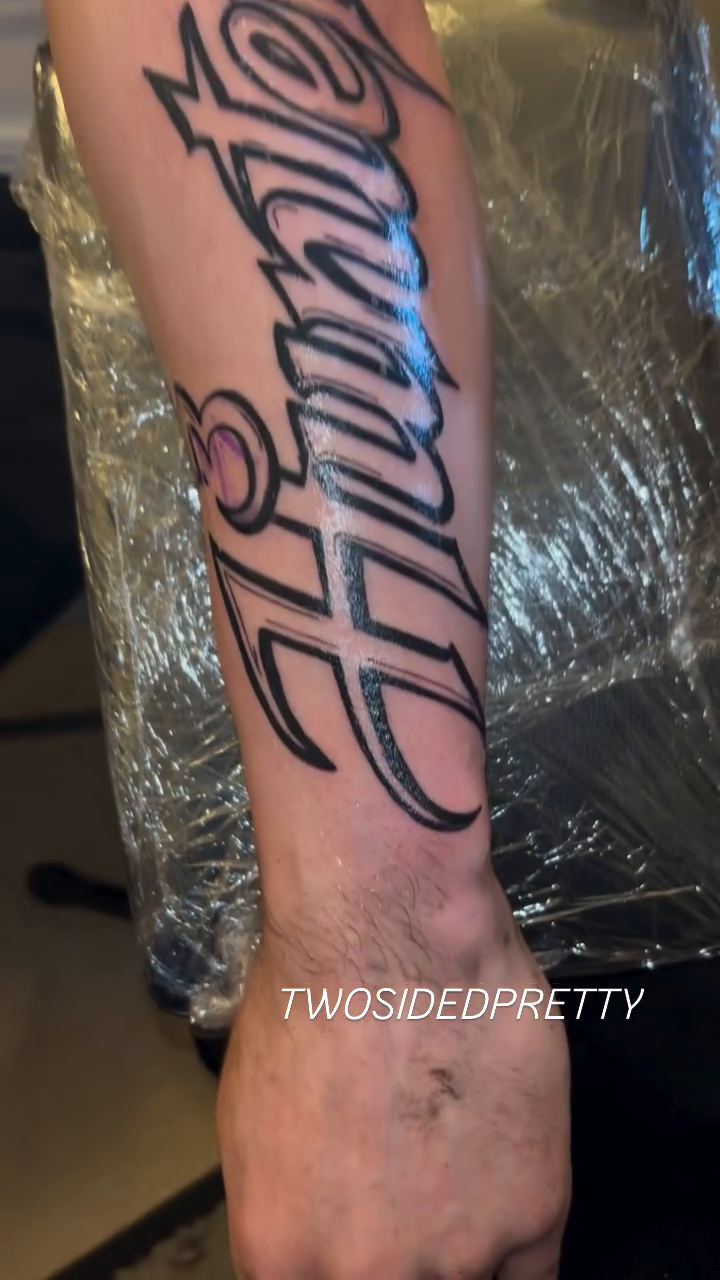 Name tattoo 'Hunter' lettering tattoo on the forearm by @twosidedpretty