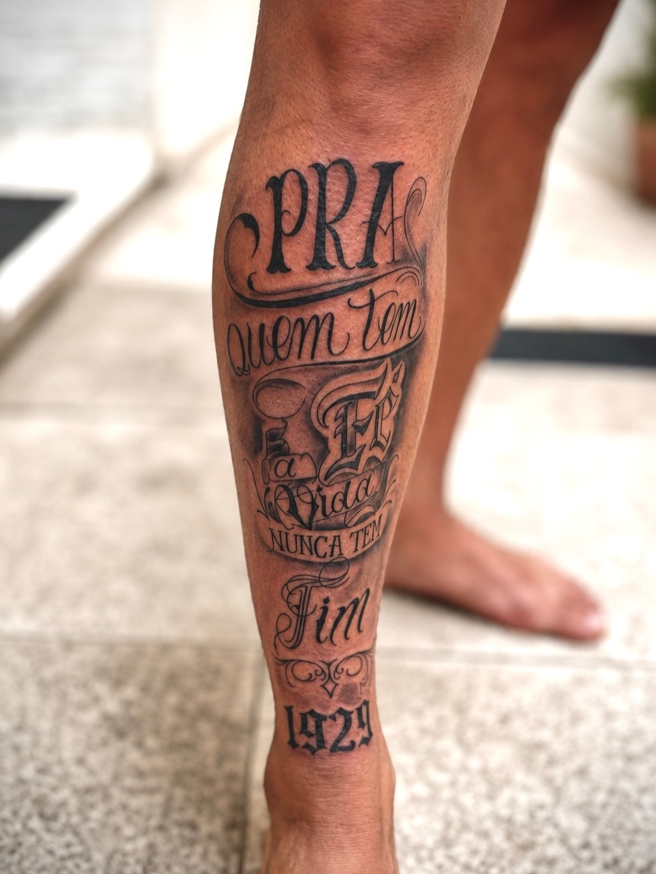 Text and numbers Chicano tattoo on the calf by Mauricio gois