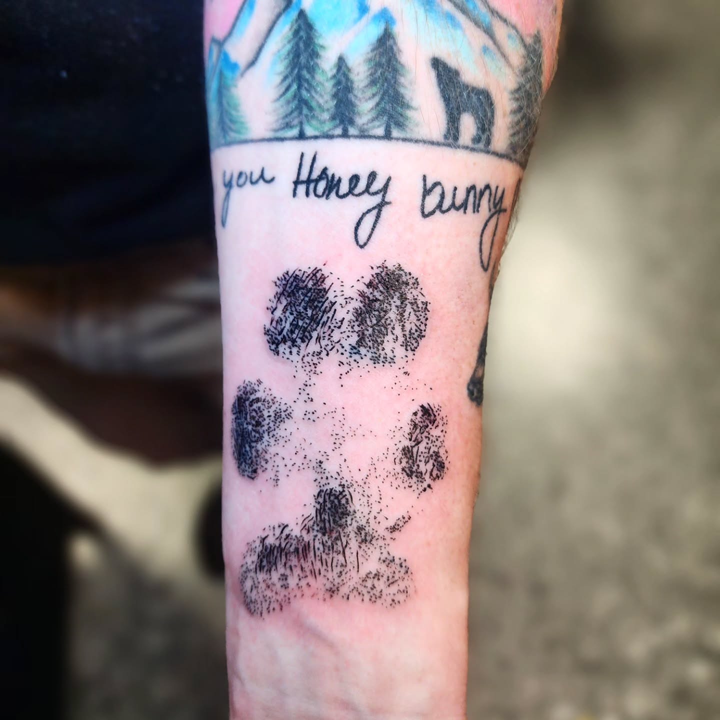 Paw print dotwork tattoo on the forearm by xavia