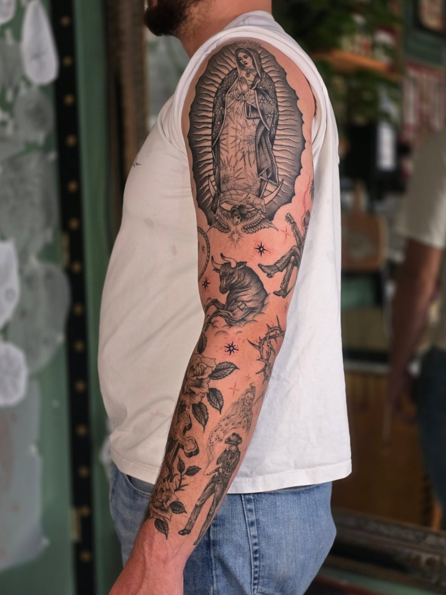 Our Lady of Guadalupe American traditional tattoo on the forearm by Aaron Dor