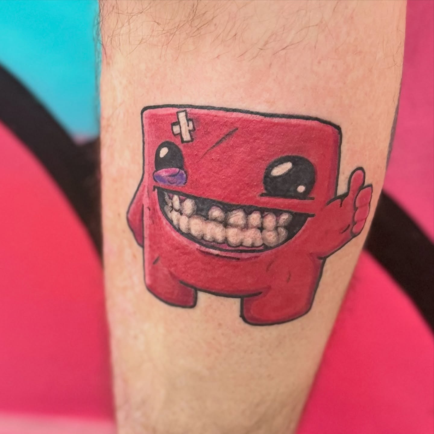 Red block character dotwork tattoo on the forearm by Chuckthegirl