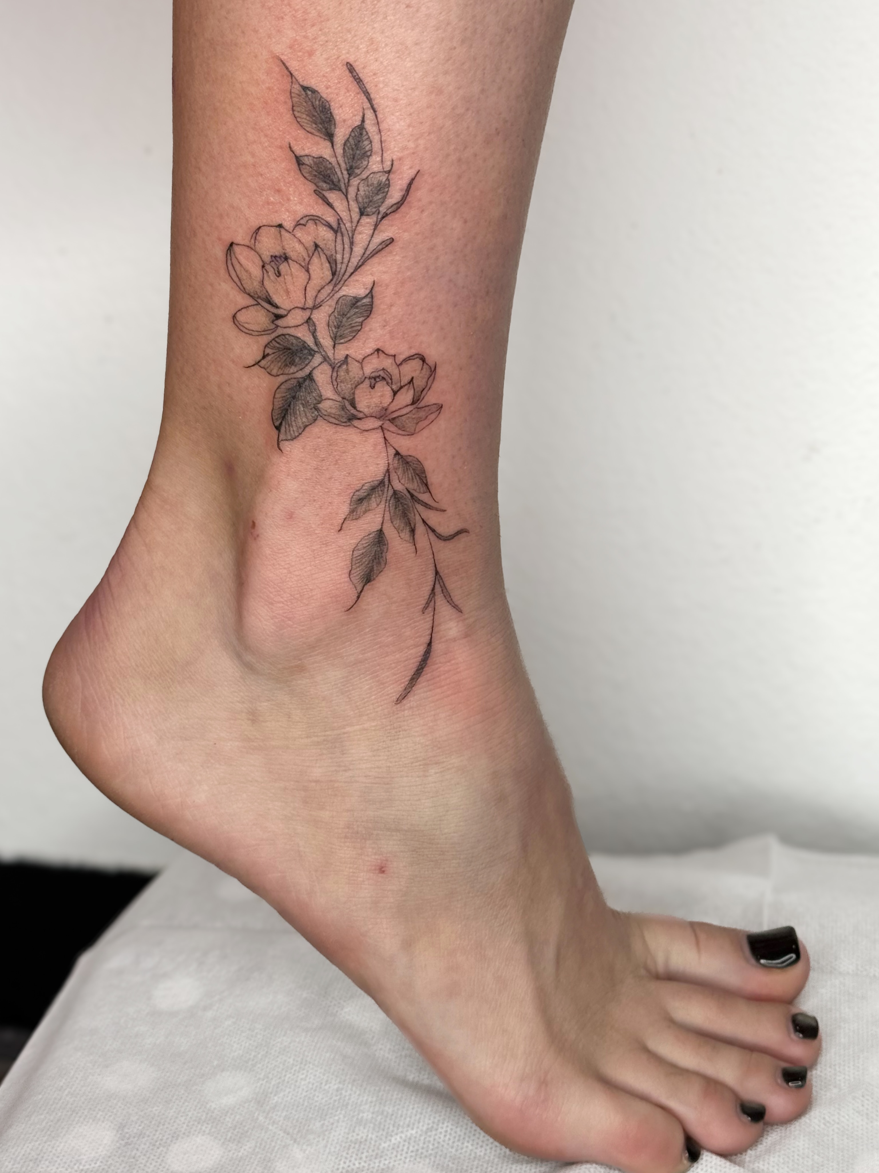 Roses black and grey tattoo on the foot by ❁ Marlo Marquise Tattoo Artist ❁