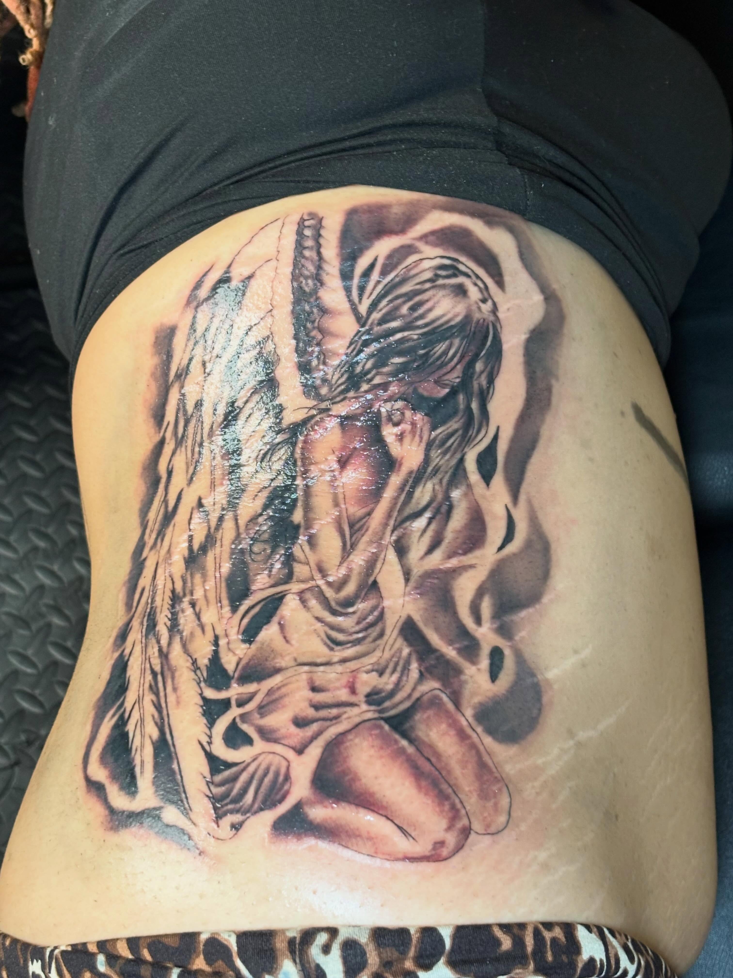 Angel realism tattoo on the thigh by Mr.K