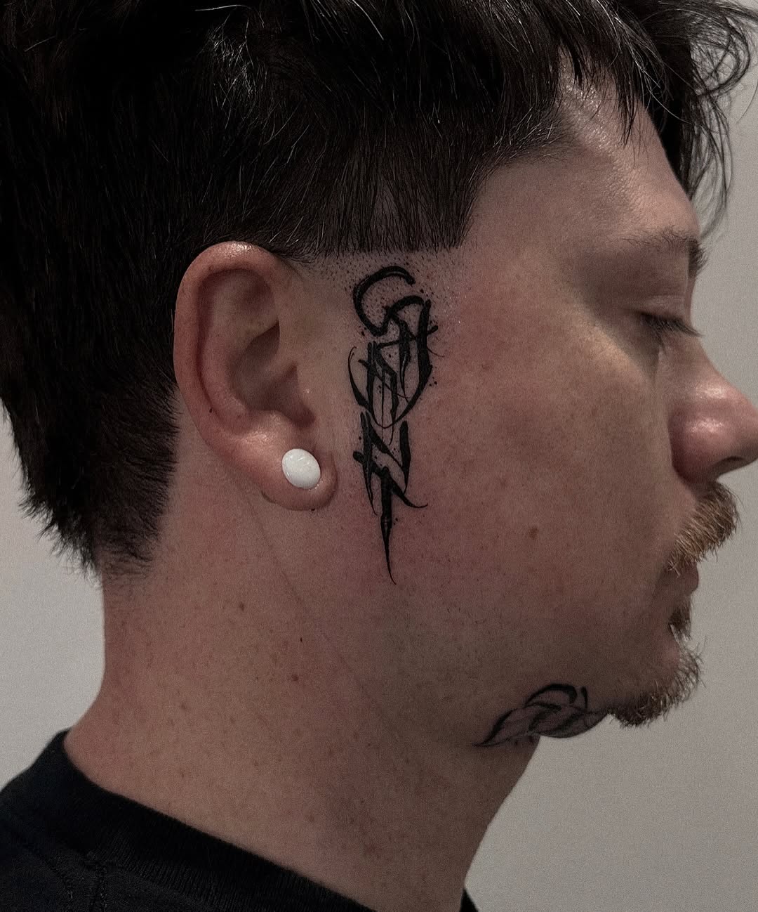 Tattoo by @marina_tats — lettering_script, blackwork
