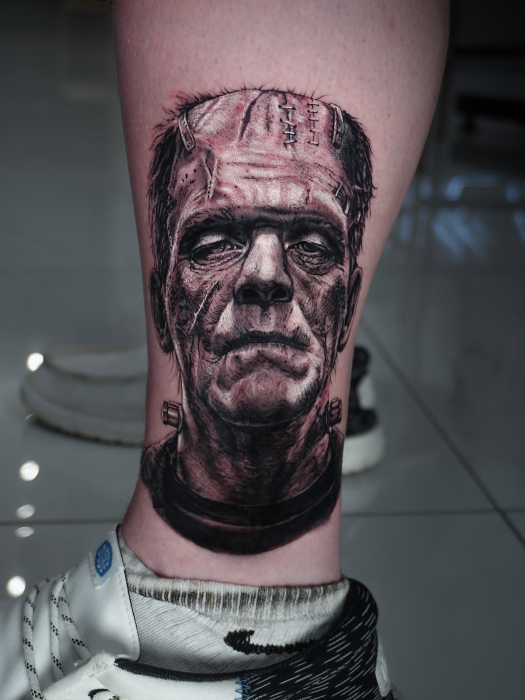Frankenstein's monster portrait realism tattoo on the forearm by Alberto M