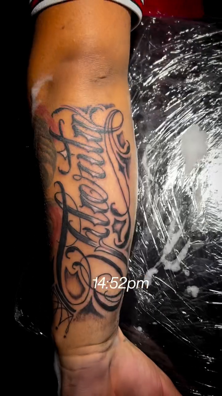 Script tattoo on forearm lettering tattoo on the forearm by Jonny Vicious