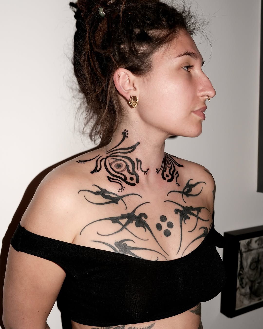 Abstract tribal design tribal tattoo on the chest by Fisher Man