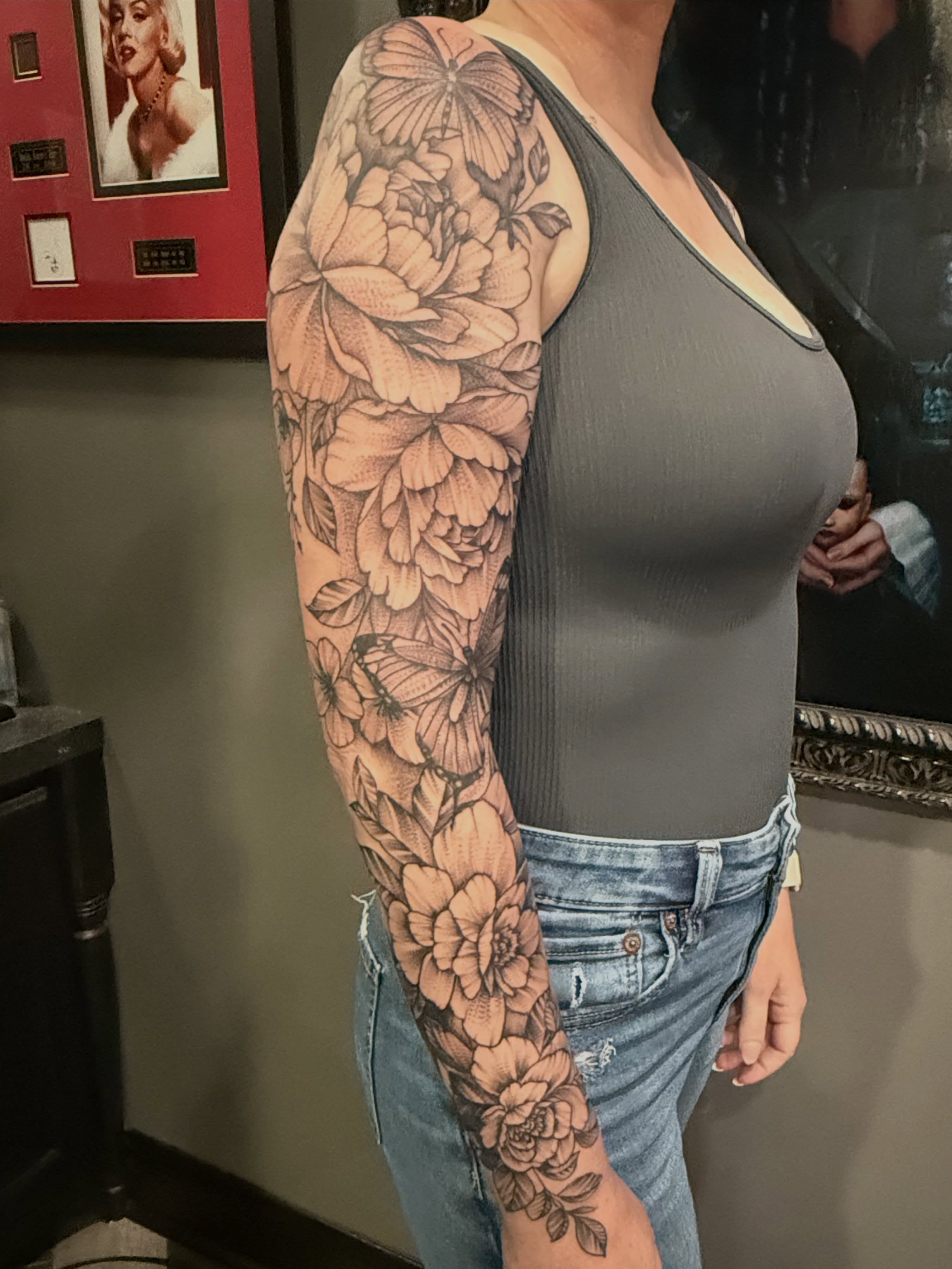Floral sleeve realism tattoo on the upper arm by Dave Potavin, Erlanger, Kentucky