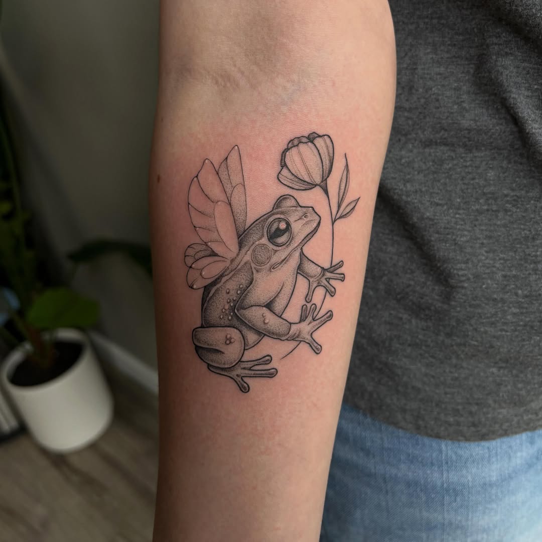 Frog with flower dotwork tattoo on the forearm by Hailey Nicole