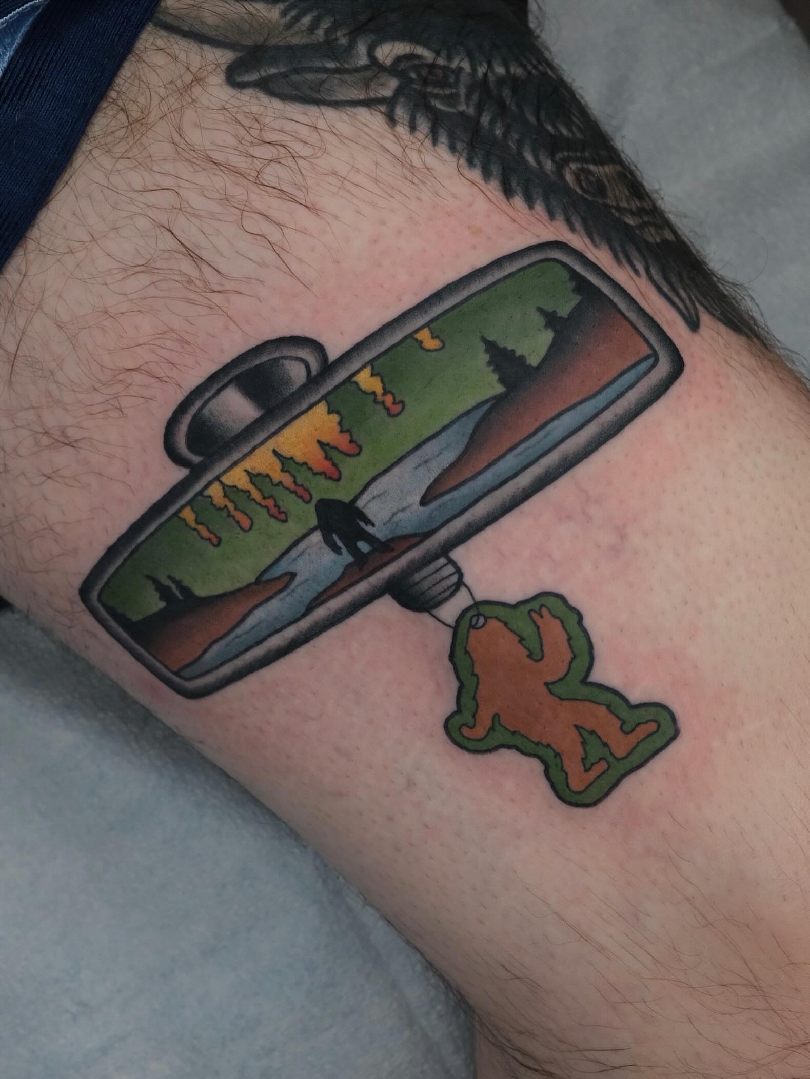 Rearview mirror American traditional tattoo on the forearm by James Maxwell