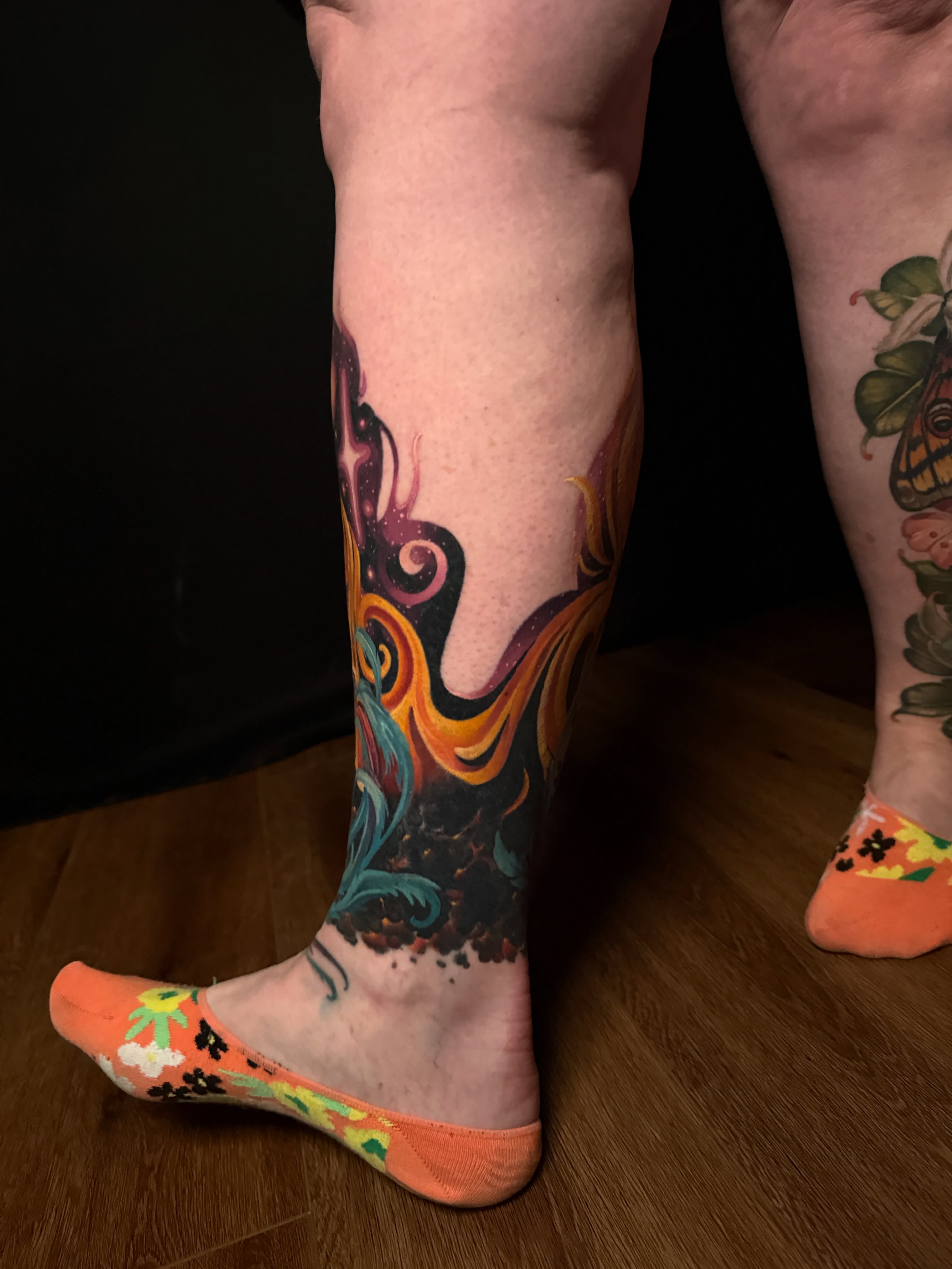 Flame and dragon new school tattoo on the calf by Brad Snow