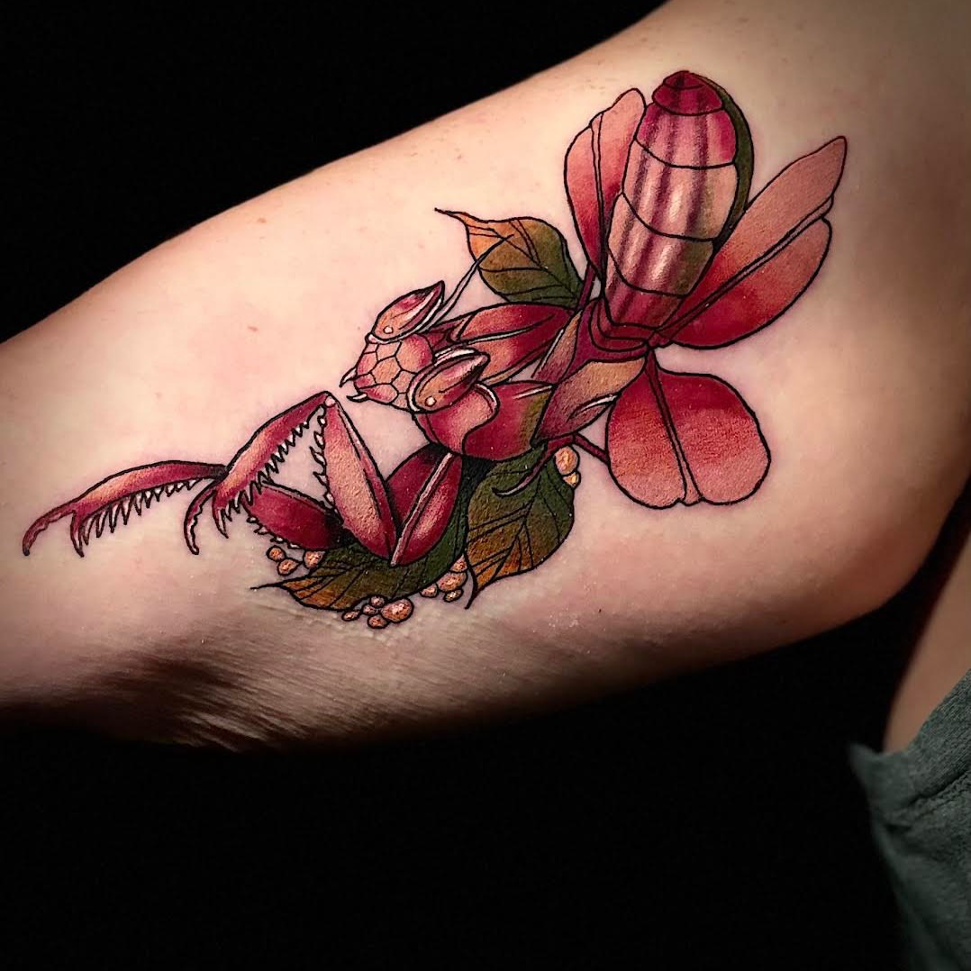 Flower realism tattoo on the forearm by Nicholas A. Estes-Davis