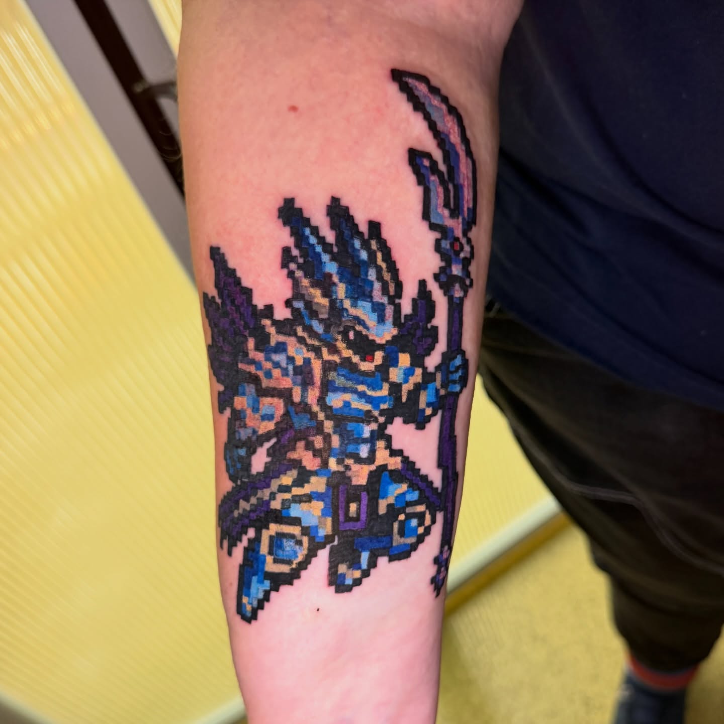 Pixel art warrior dotwork tattoo on the forearm by Abbie Kaitlynn Taylor, Dayton, Ohio