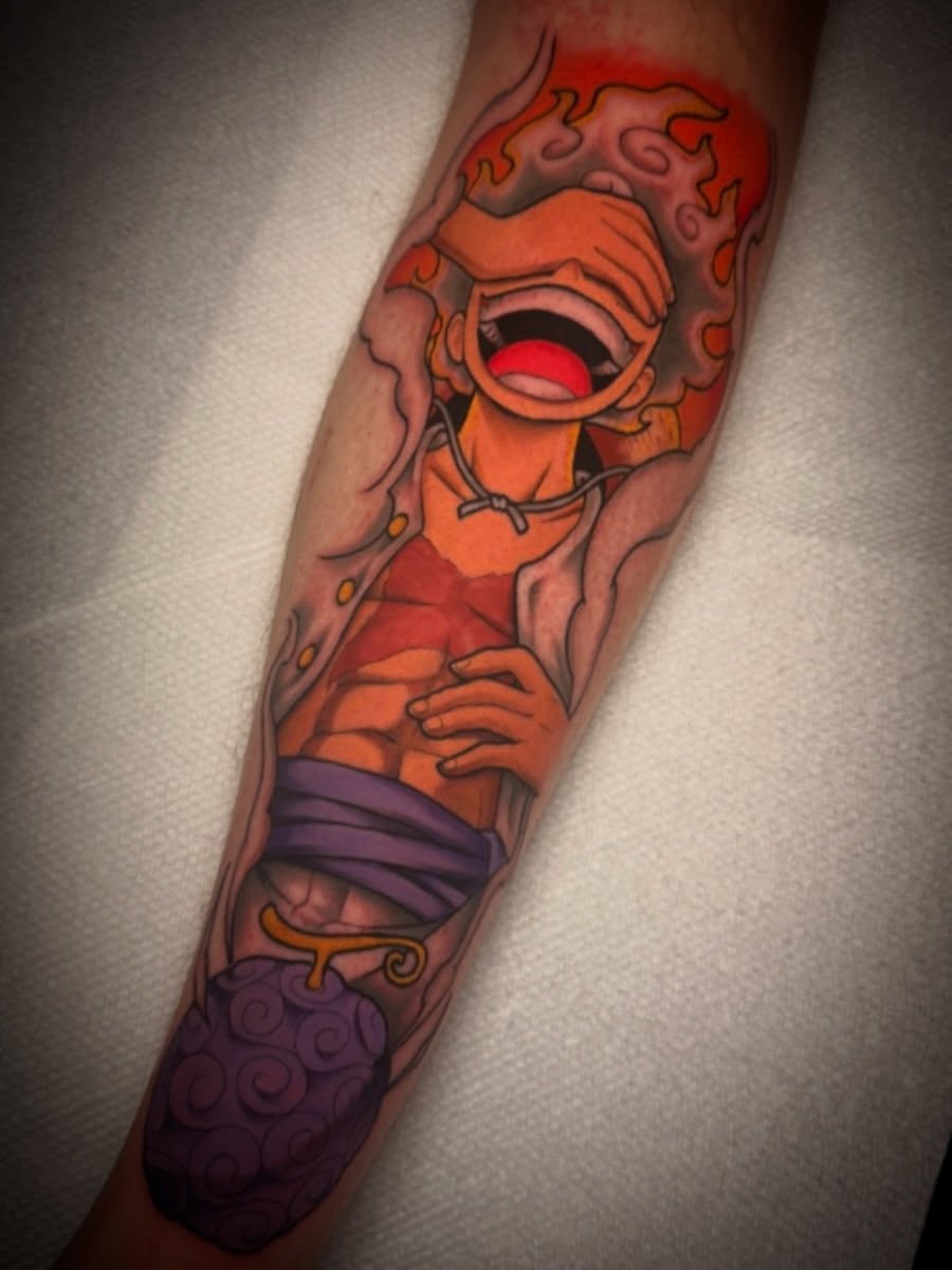 Chopper anime tattoo on the forearm by Dave Osrowitz