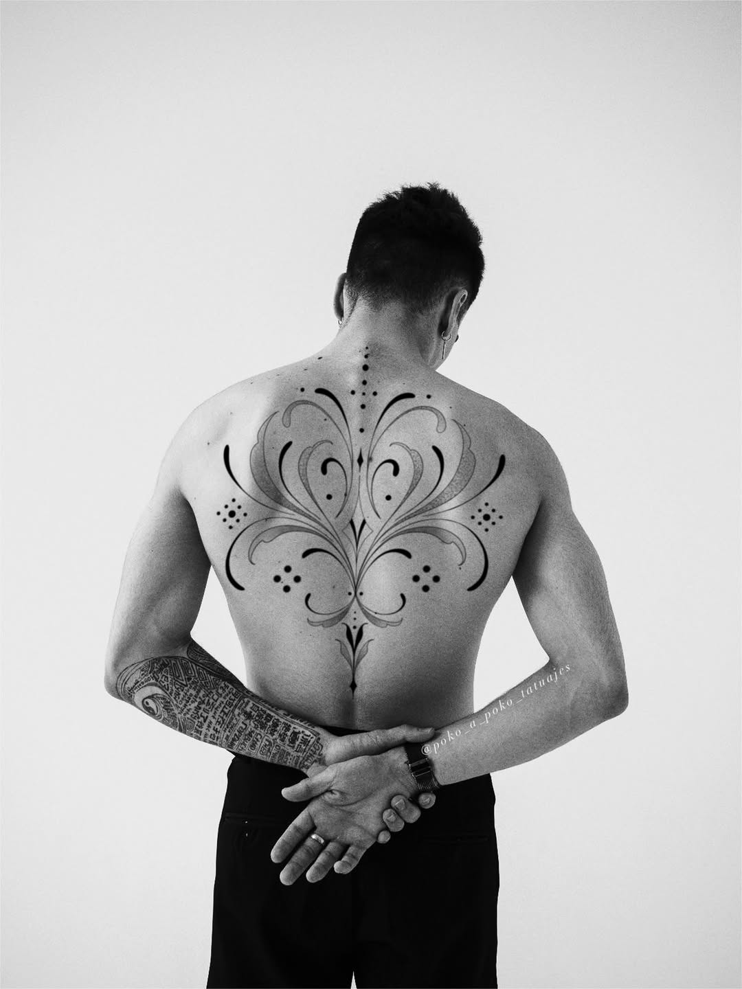 Ornamental back piece with dots tattoo on the back by @ethereal.ornamentalism