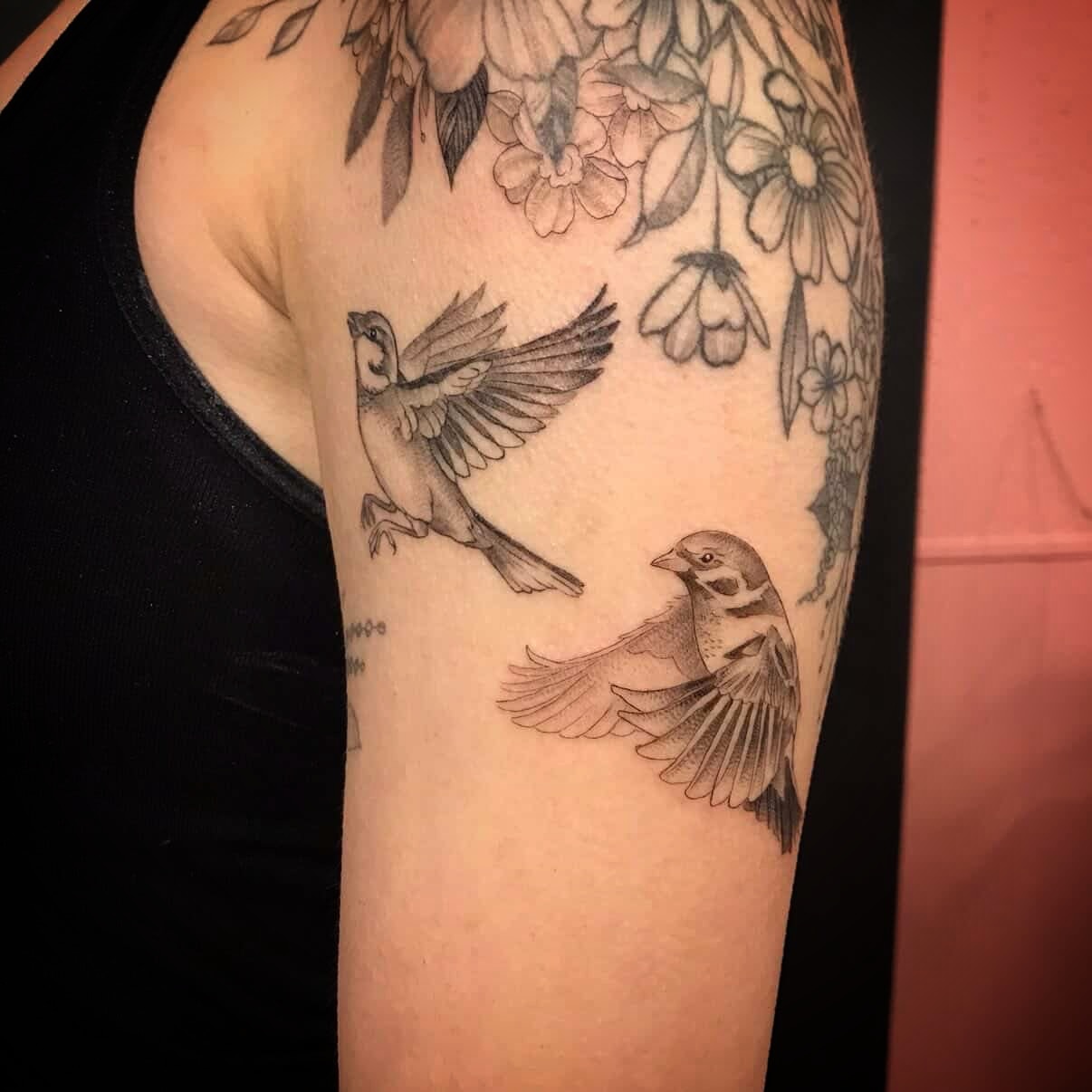 Sparrows and flowers black and grey tattoo on the forearm by Justin Turkus