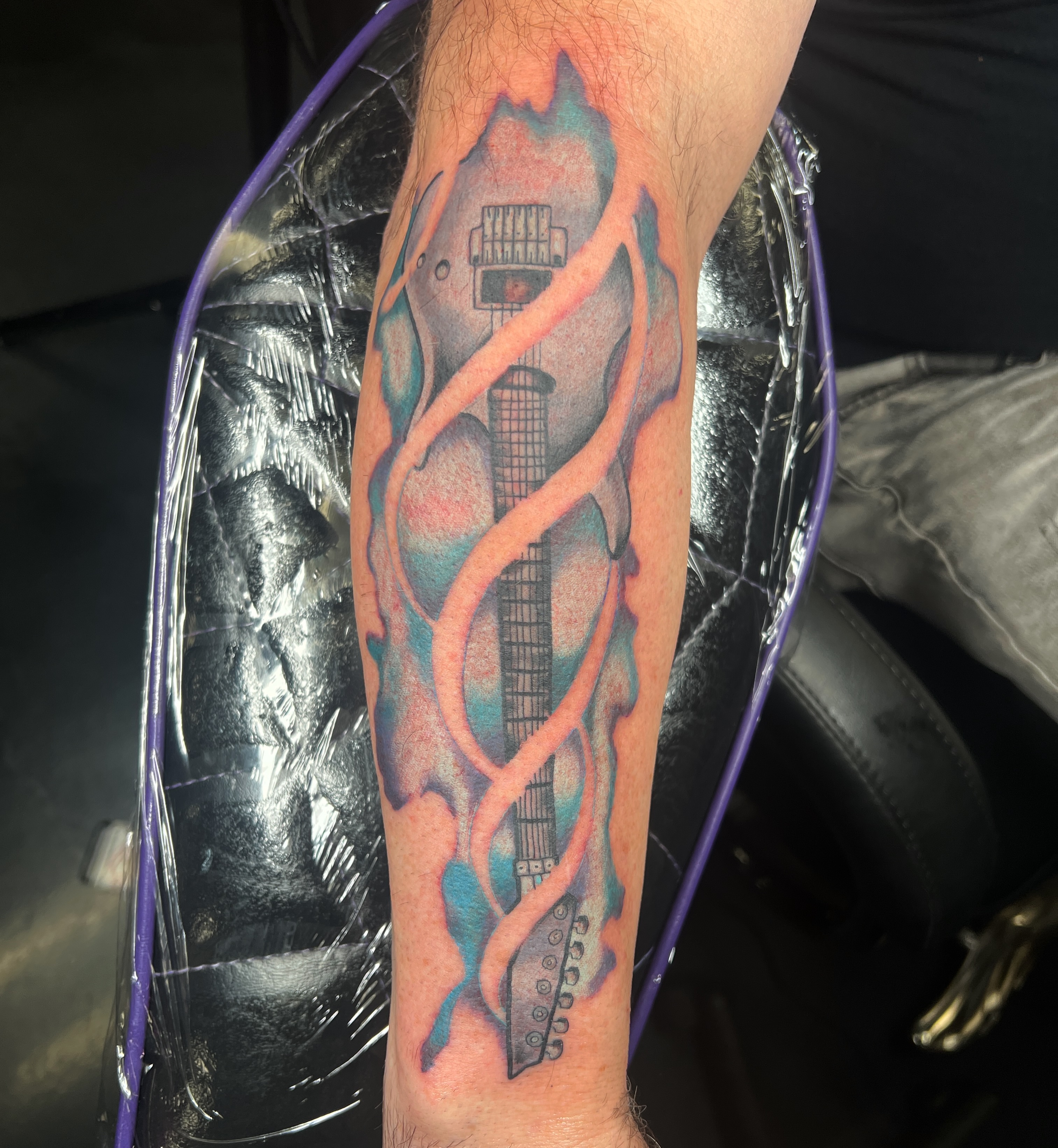 Electric guitar dotwork tattoo on the forearm by Brian Mock