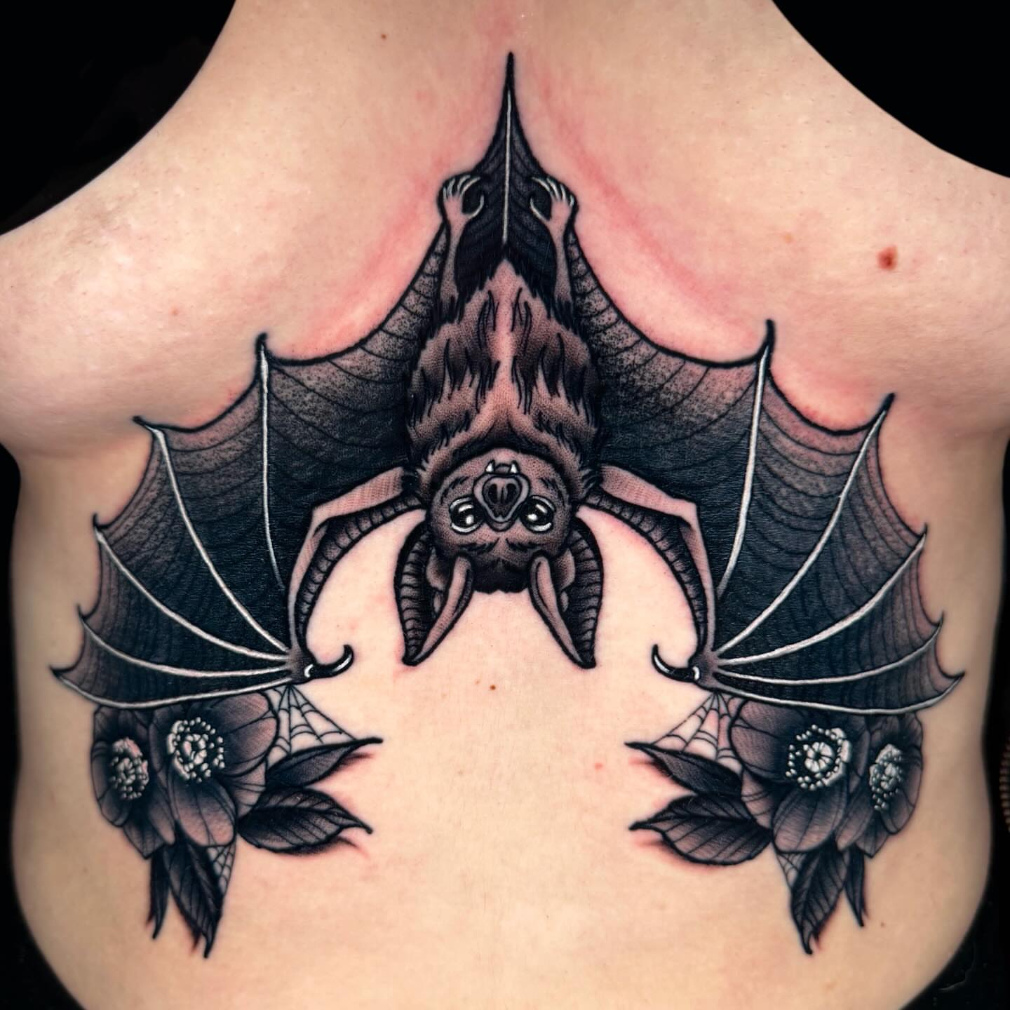 Bat black and grey tattoo on the chest by Trenton Helms