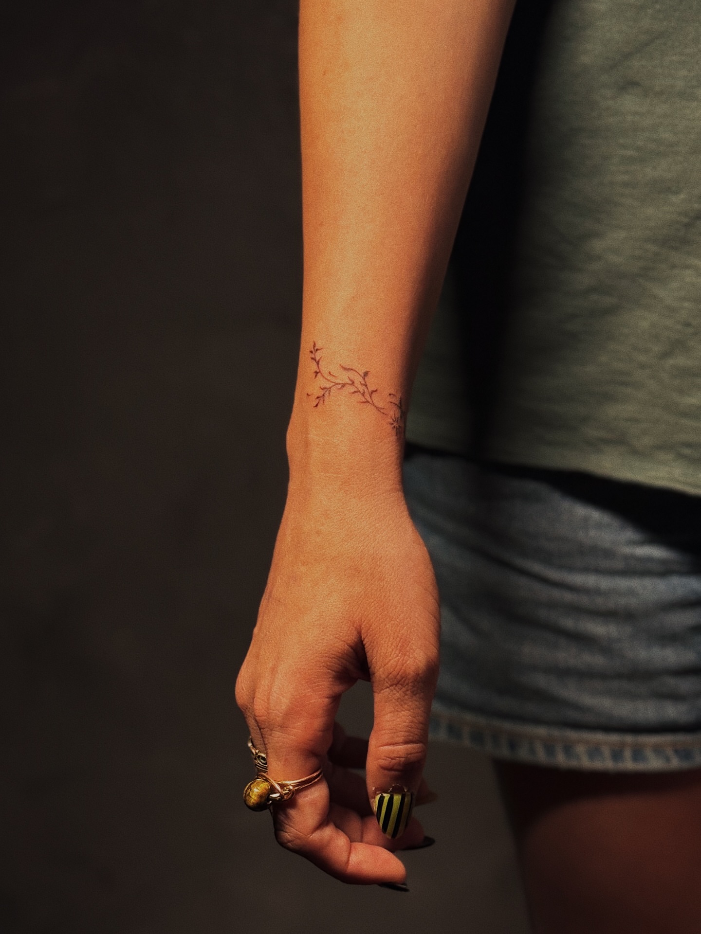 Branch fine line tattoo on the forearm by Luisa Duarte