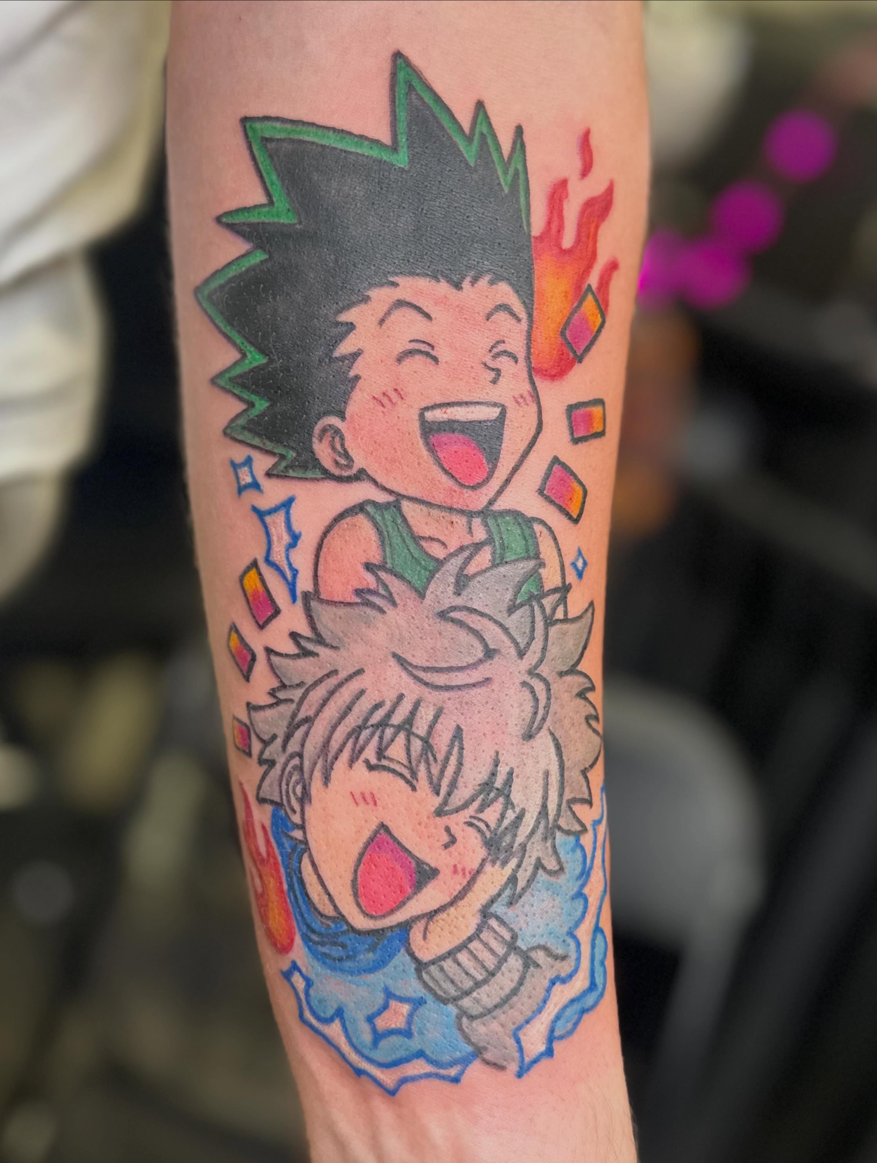 Hunters x Hunter characters anime tattoo on the forearm by Zen Forbes
