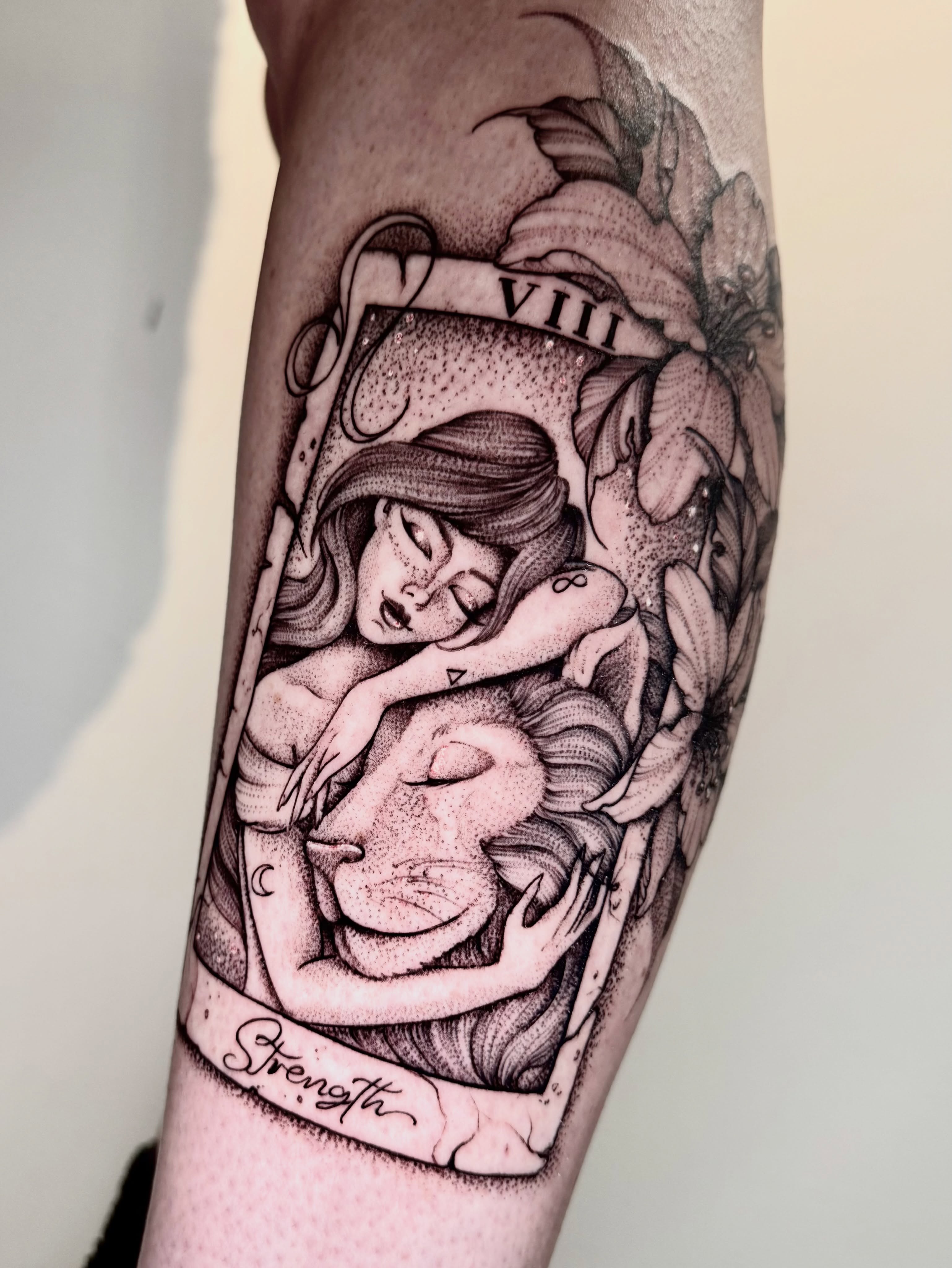 Strength card dotwork tattoo on the forearm by ℳ𝒾𝓇𝓉𝒽𝒶 𝒯ℴ𝓇𝓇ℯ𝓈, San Diego, California