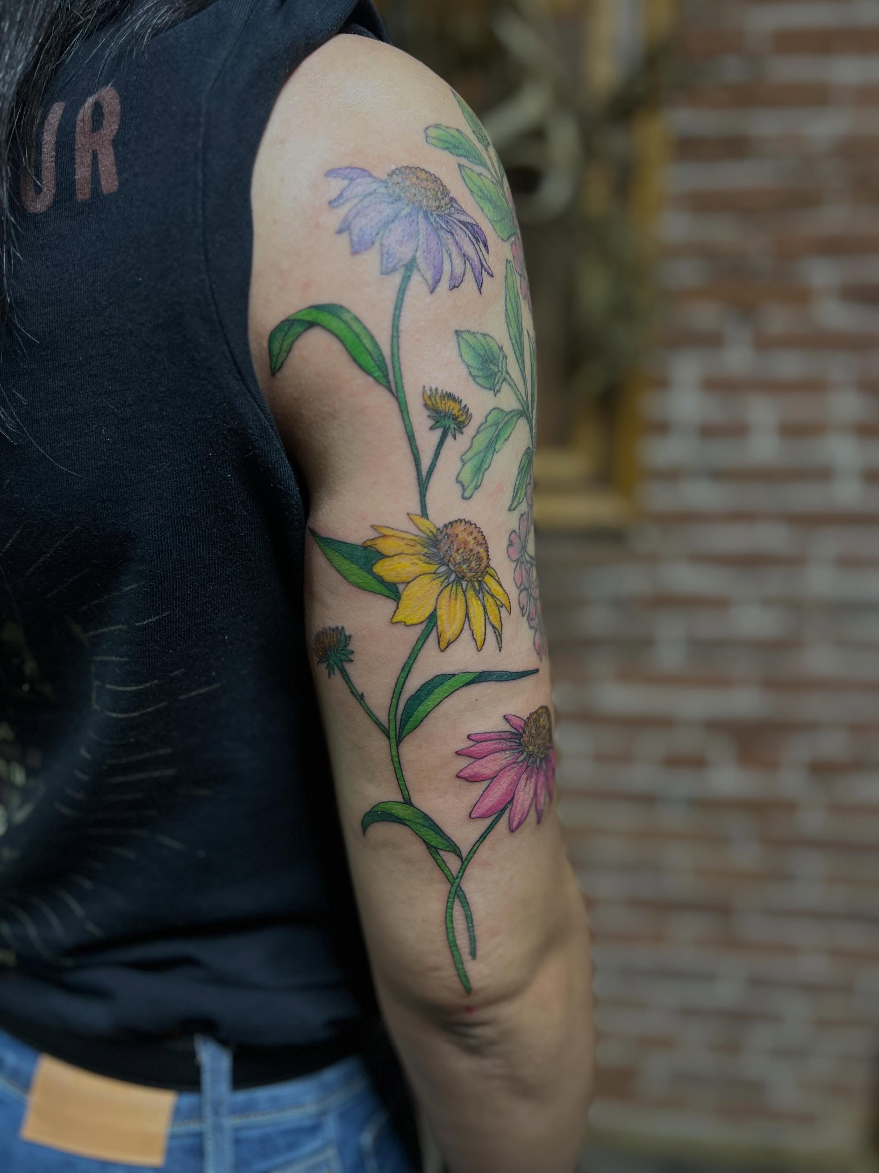 Flowers realism tattoo on the forearm by Tattoo Artist, Kansas City, Missouri