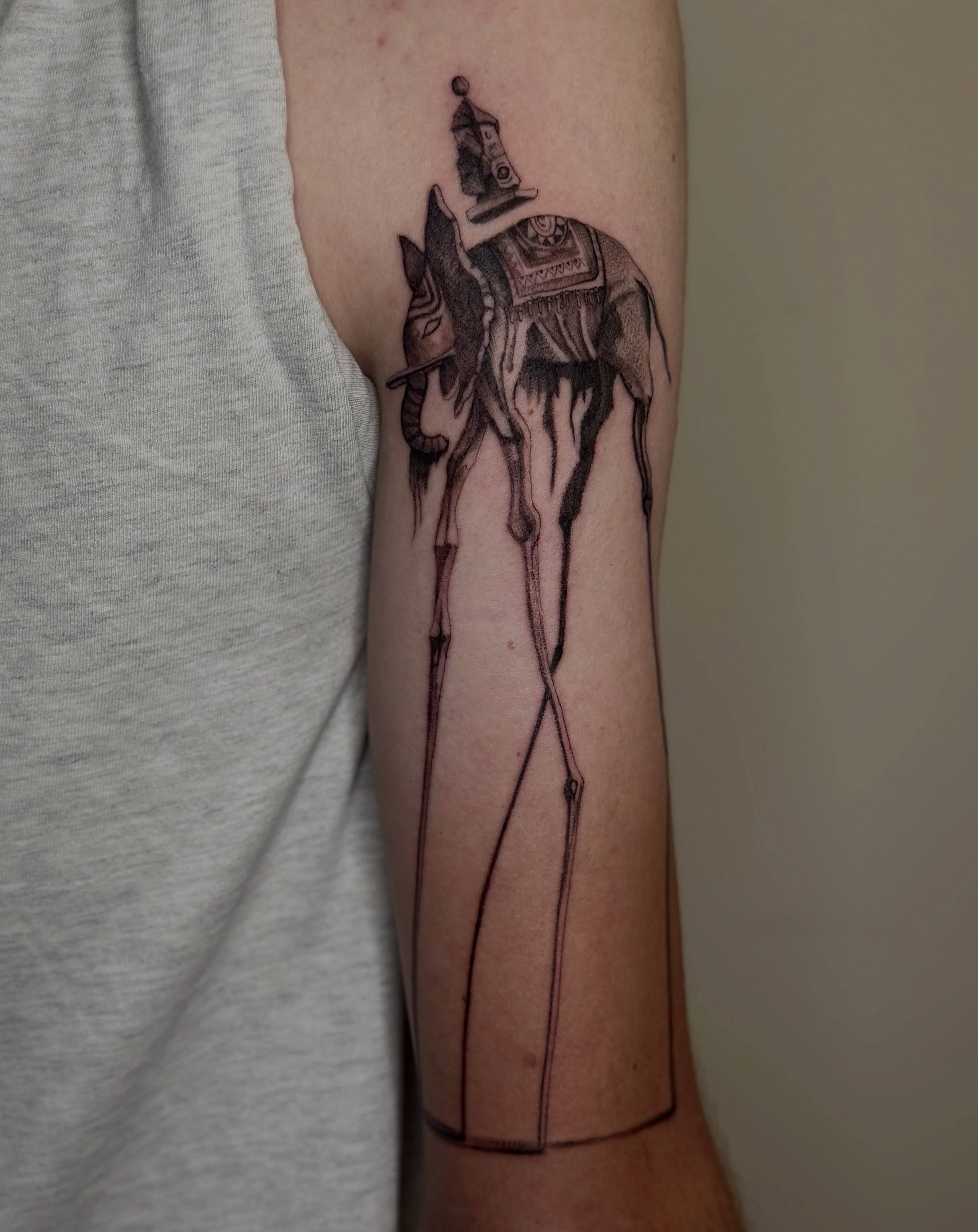 Elephant black and grey tattoo on the forearm by Macy Rae