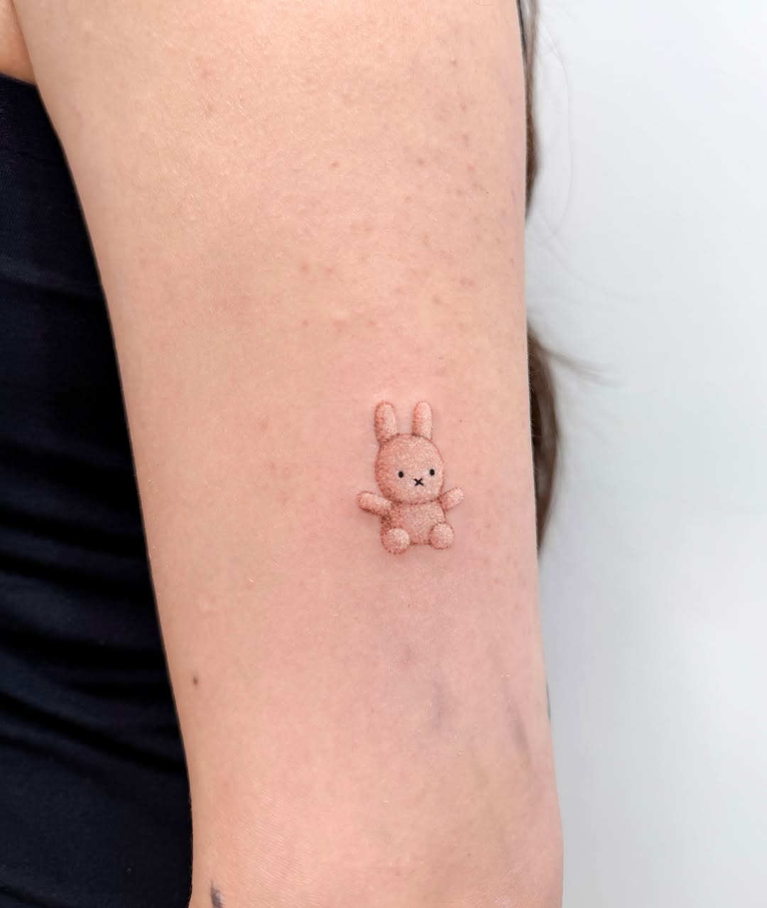 Rabbit minimalist tattoo on the forearm by Hery Anwar