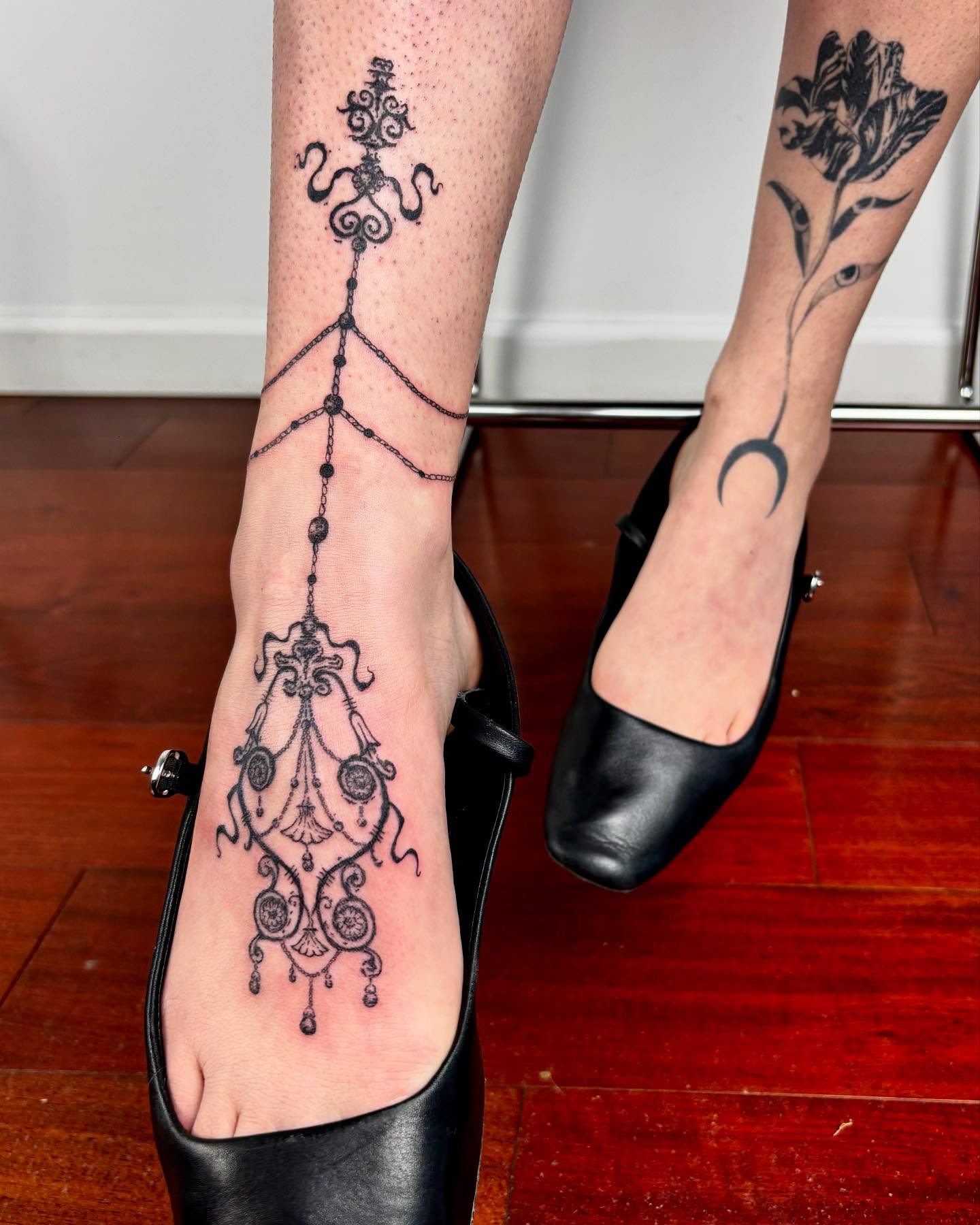 Chandelier ornamental tattoo on the foot by kendle