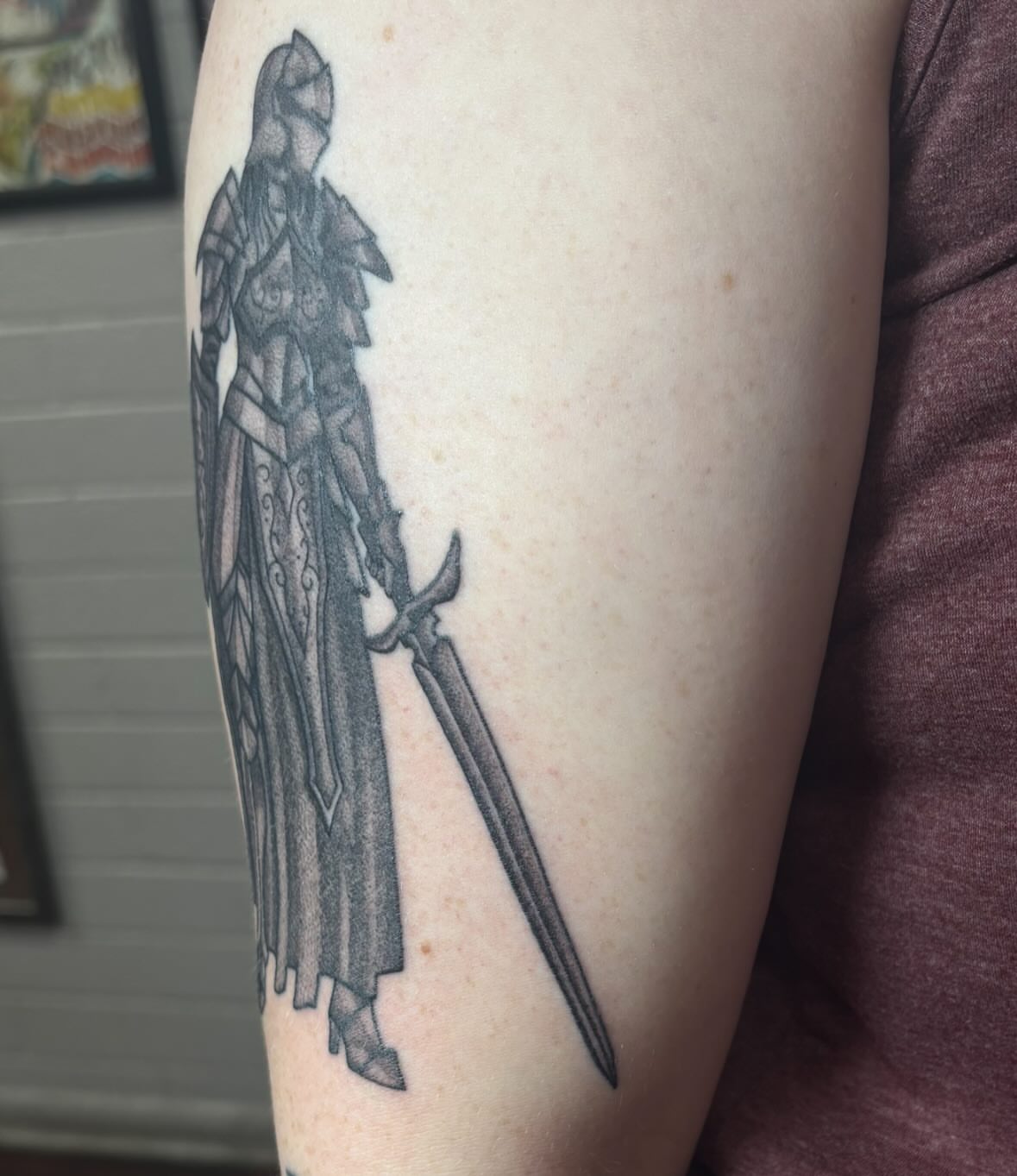 Knight with sword black and grey tattoo on the forearm by ๐๐๐ฑ๐ฑ๐ฌ๐ฌ ๐๐ฏ๐ฑ๐ฆ๐ฐ๐ฑ