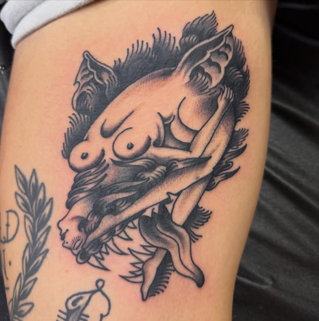 Woman riding boar American traditional tattoo on the thigh by Kane L, Albuquerque, New Mexico