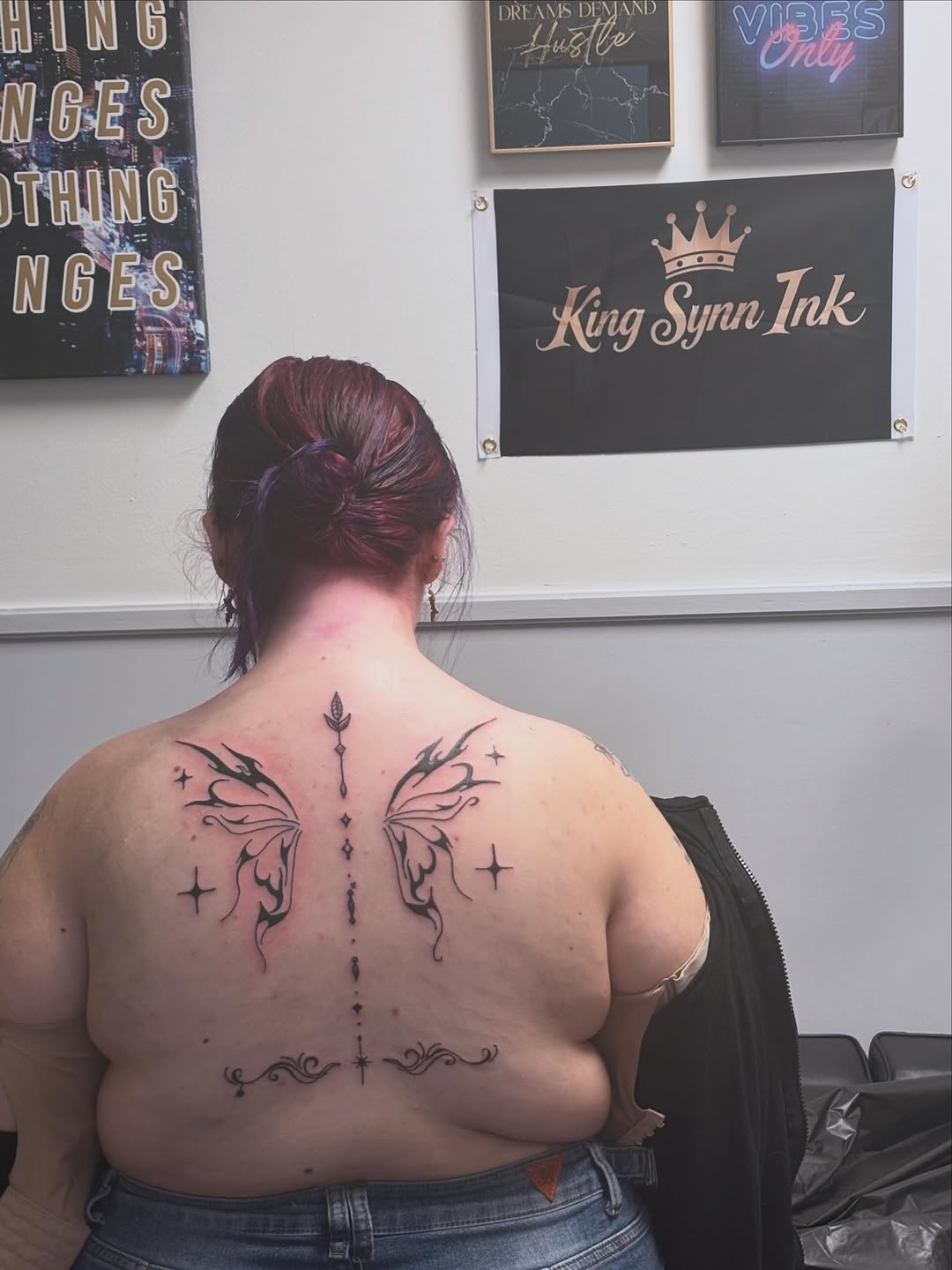 Butterfly wings and decorative elements blackwork tattoo on the back by Syneca Wilson, Acton, Massachusetts
