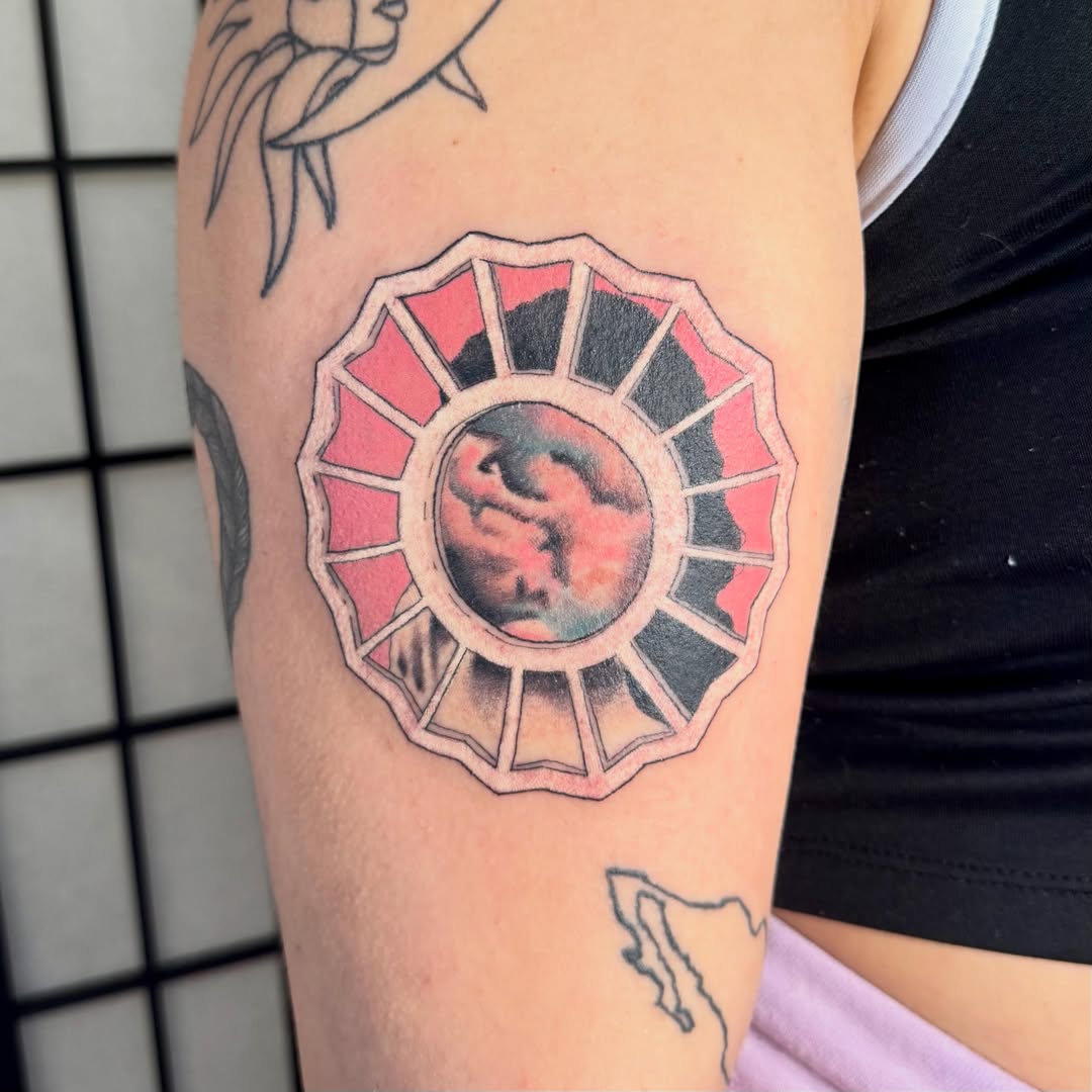 Abstract geometric design geometric tattoo on the forearm by Zac Smith-Chevalier