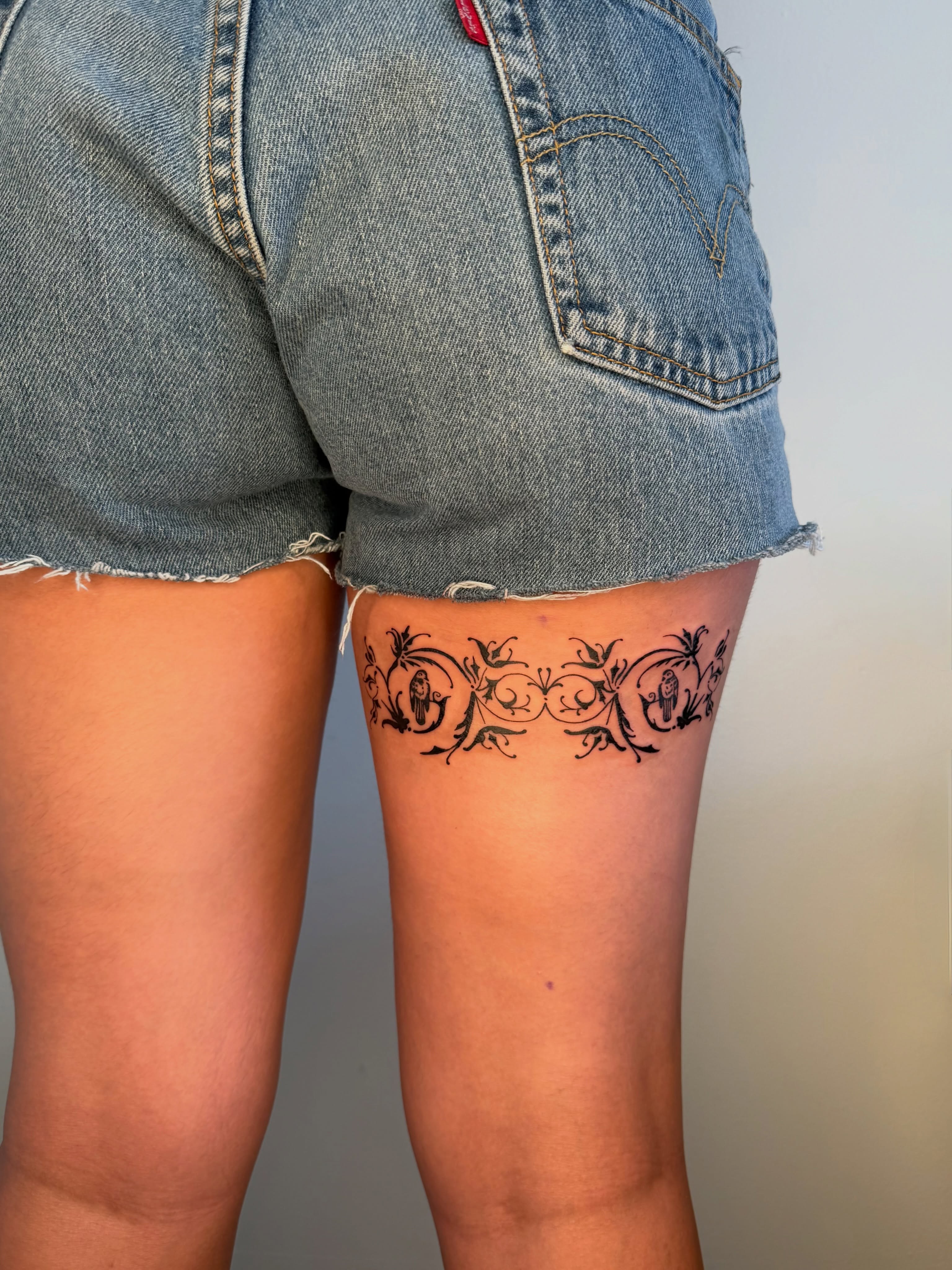 Floral vine ornamental tattoo on the thigh by ♤ Catherine Stengel ♤