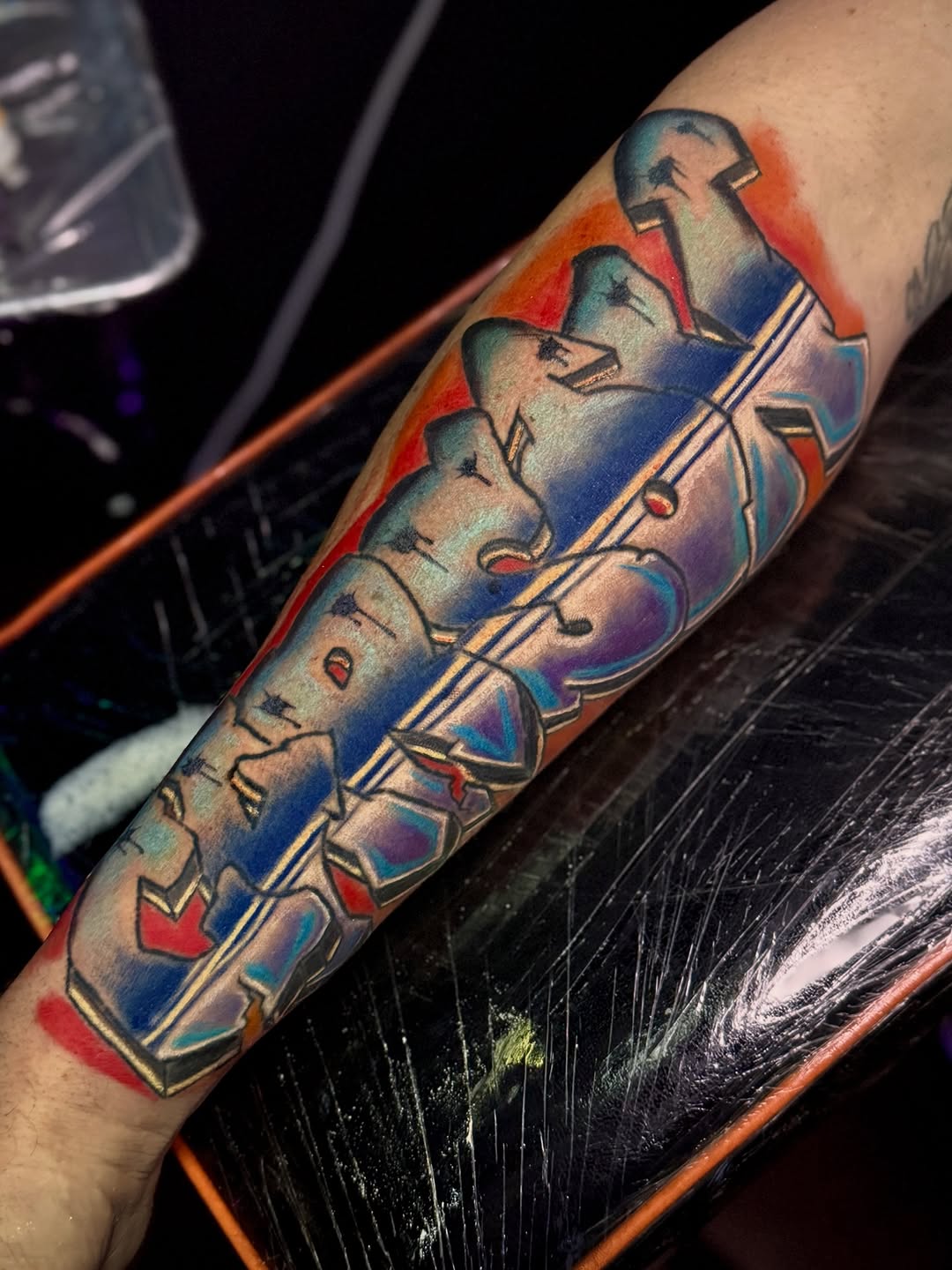 Graffiti lettering lettering tattoo on the forearm by Jarrod Gatzke