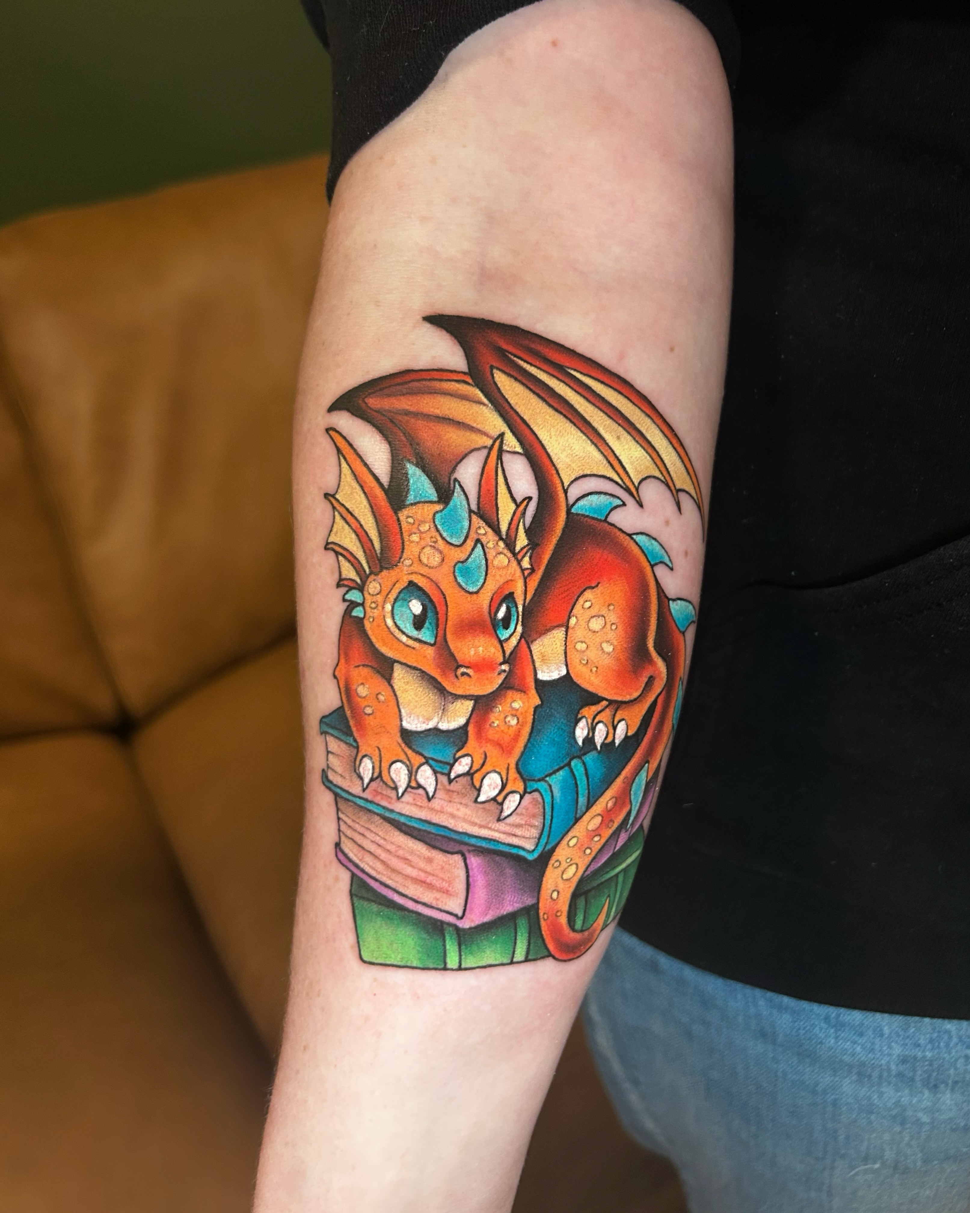 Dragon American traditional tattoo on the forearm by Zephyr