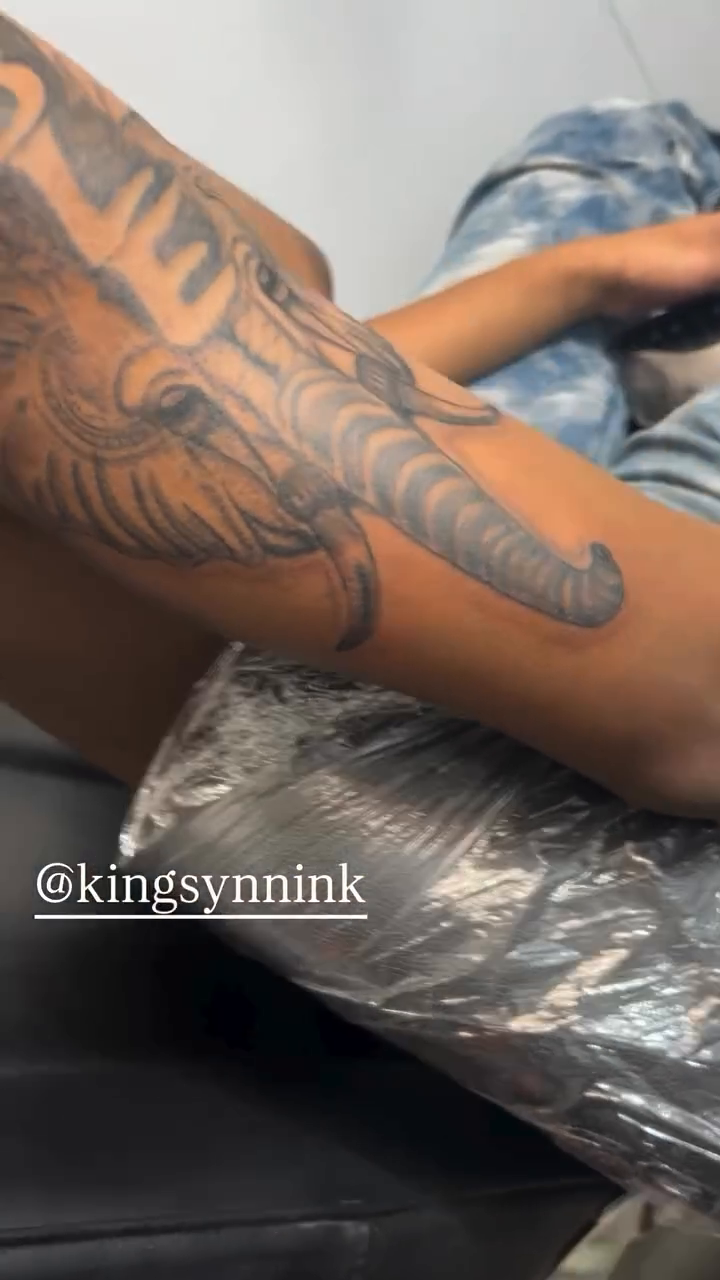 Elephant with "Humble" text tattoo on the upper arm by Syneca Wilson, Acton, Massachusetts