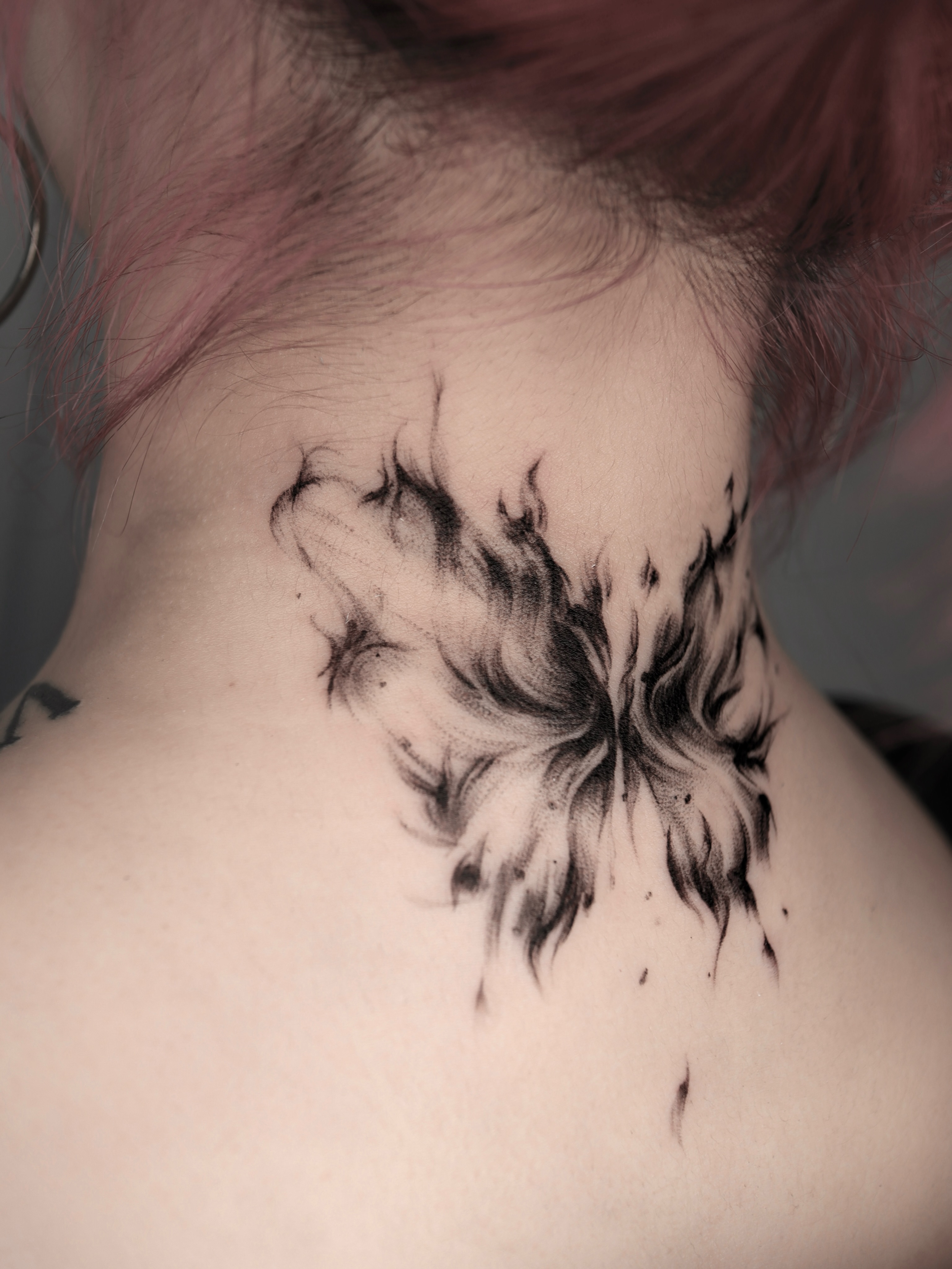 Floral black and grey tattoo on the neck by @tattoo_chamsae