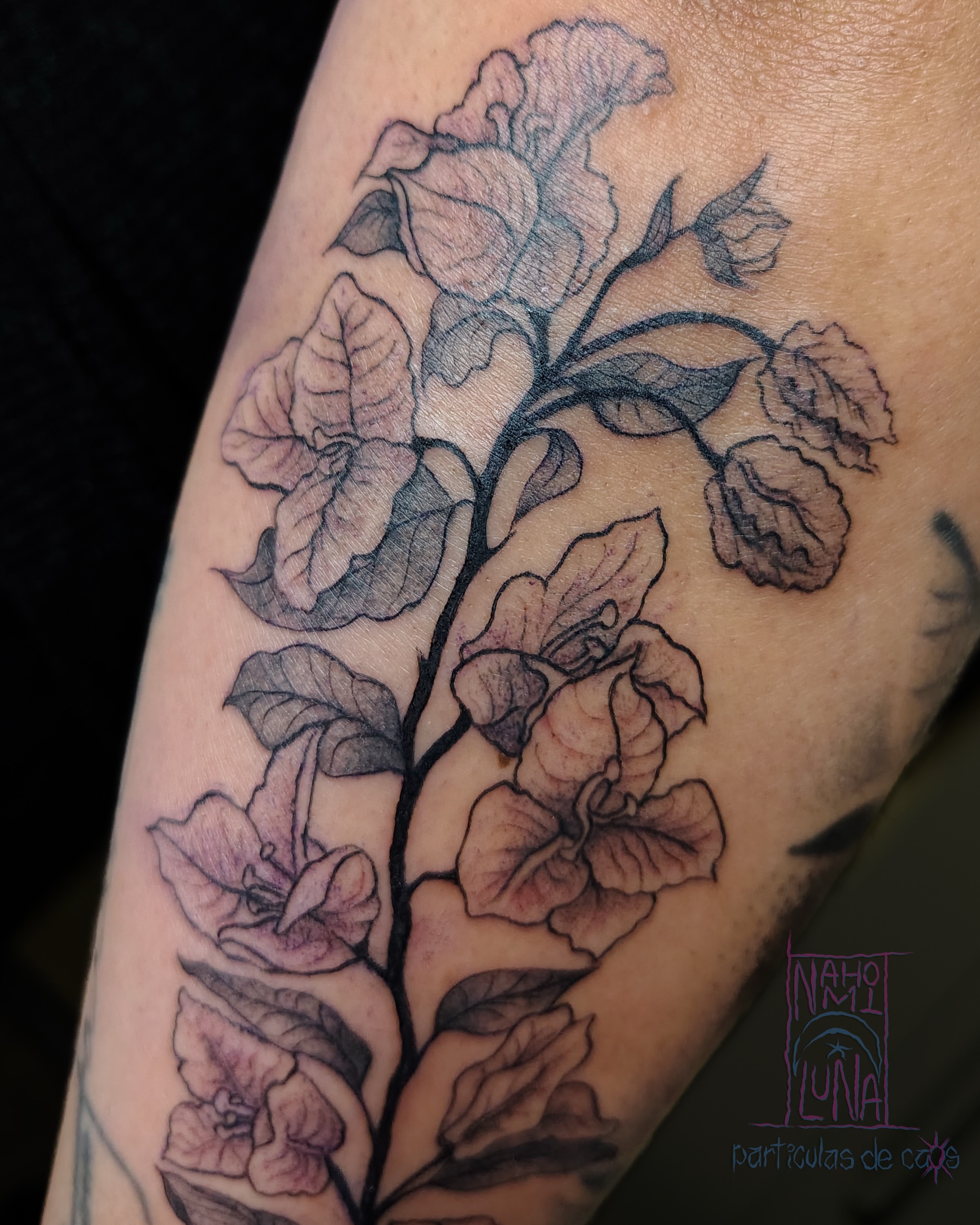 Flower bouquet realism tattoo on the forearm by Nahomi Luna - Memphis & Cordova Tattoo, Memphis, Tennessee