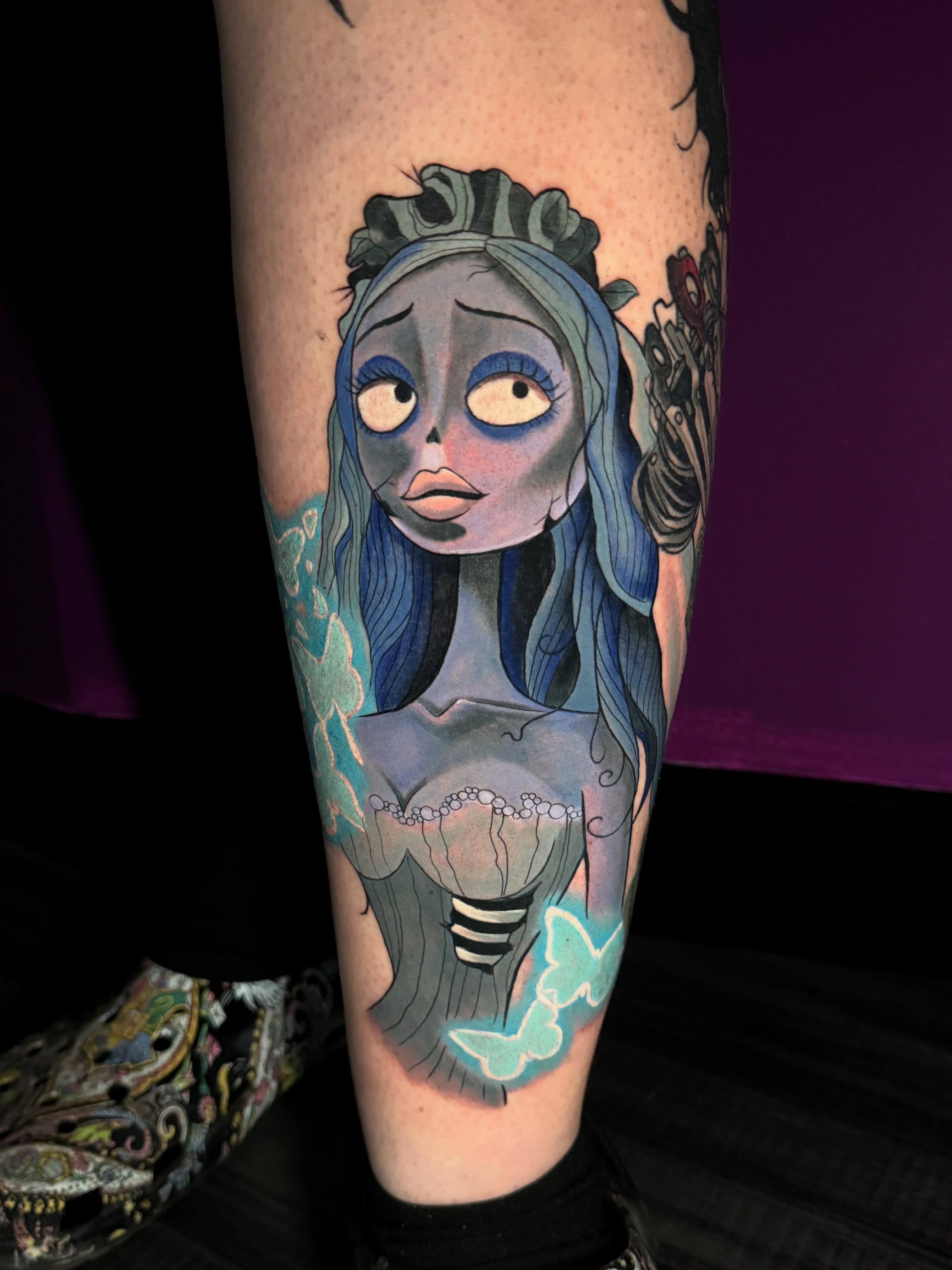 Anime-style character anime tattoo on the calf by Jennifer Kovach, Gastonia, North Carolina