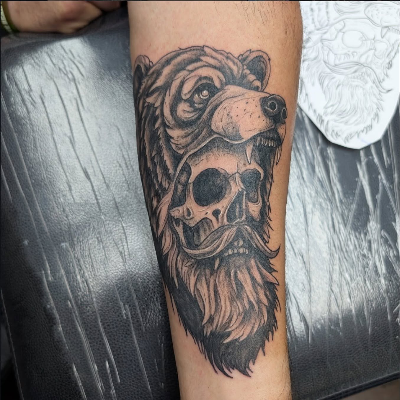 Bear skull realism tattoo on the forearm by Ben Cecil, Summerville, South Carolina