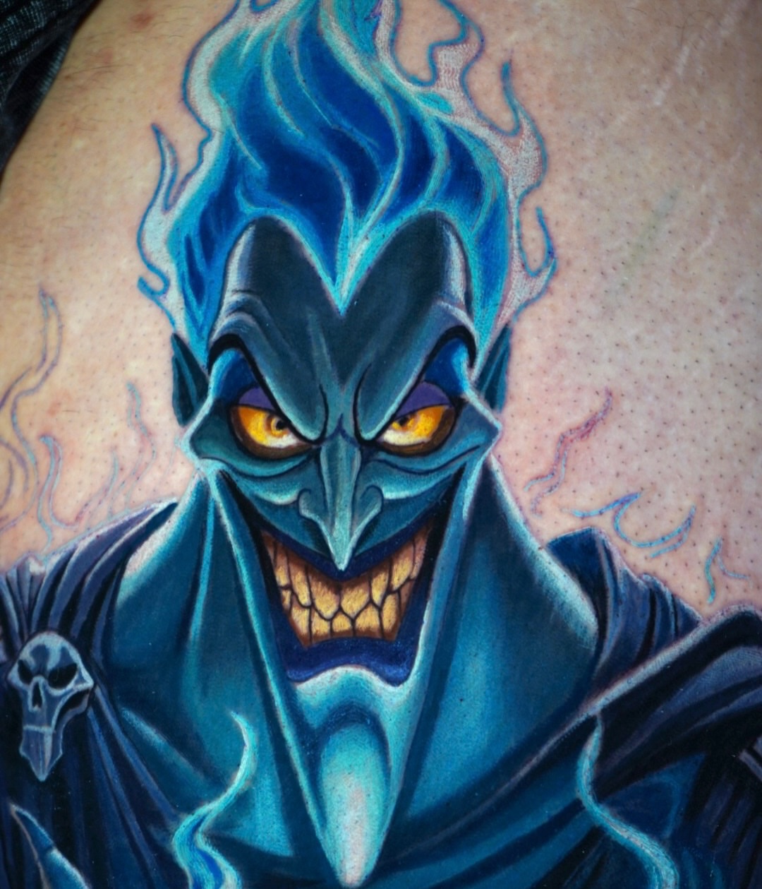 Blue ghost-like figure dark realism tattoo on the back by Benjamin Xavier Valadez