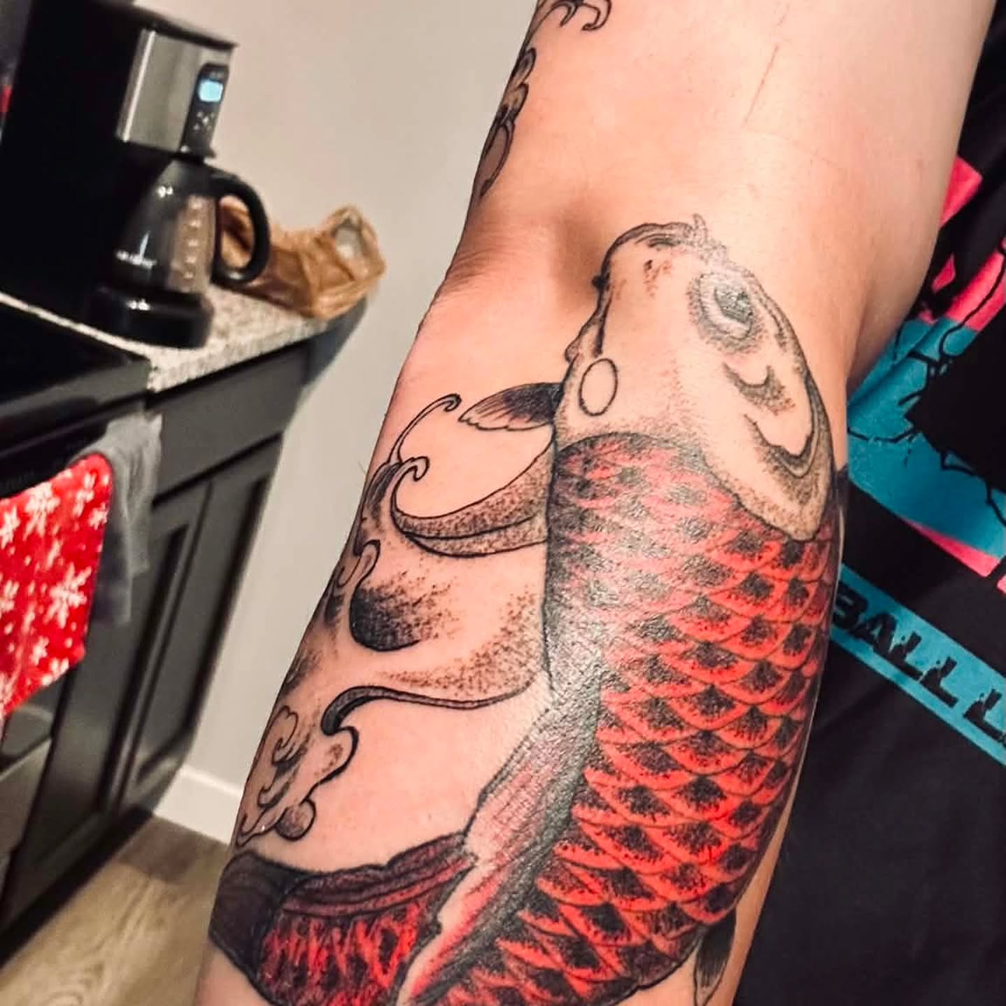 Koi fish dotwork tattoo on the forearm by @rockinr33d.tattoos