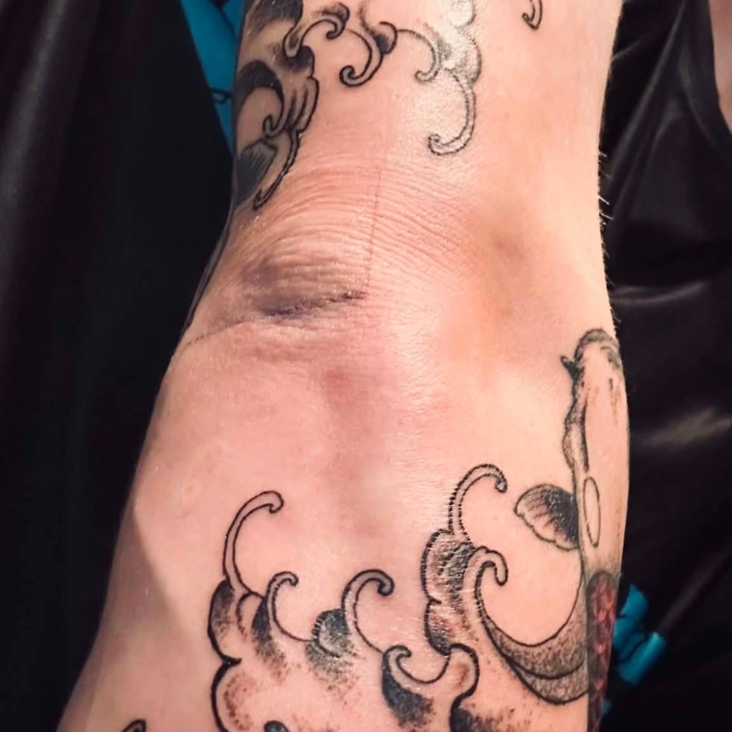 Flames black and grey tattoo on the forearm by @rockinr33d.tattoos