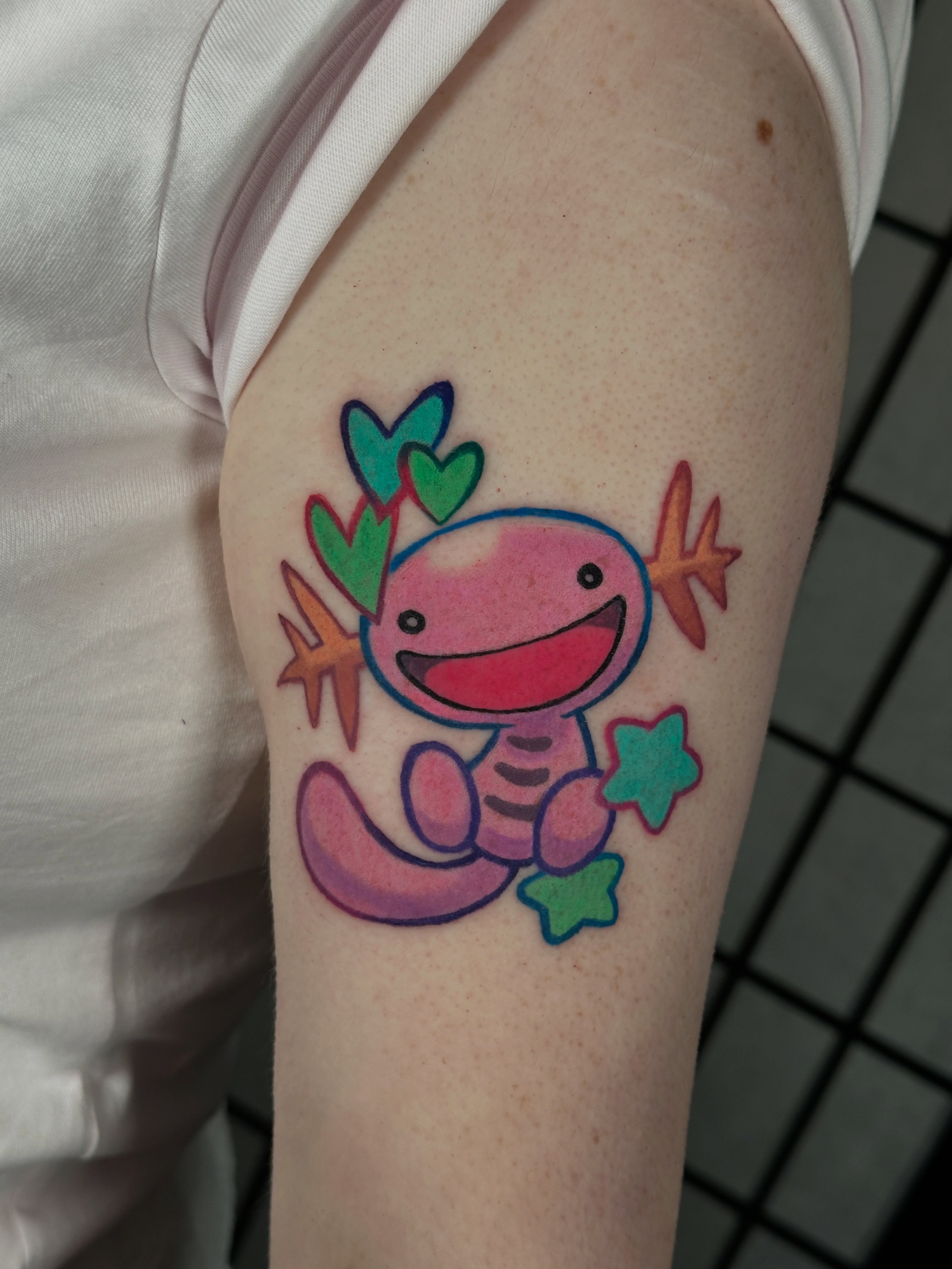 Axolotl new school tattoo on the forearm by Dustin Hughes