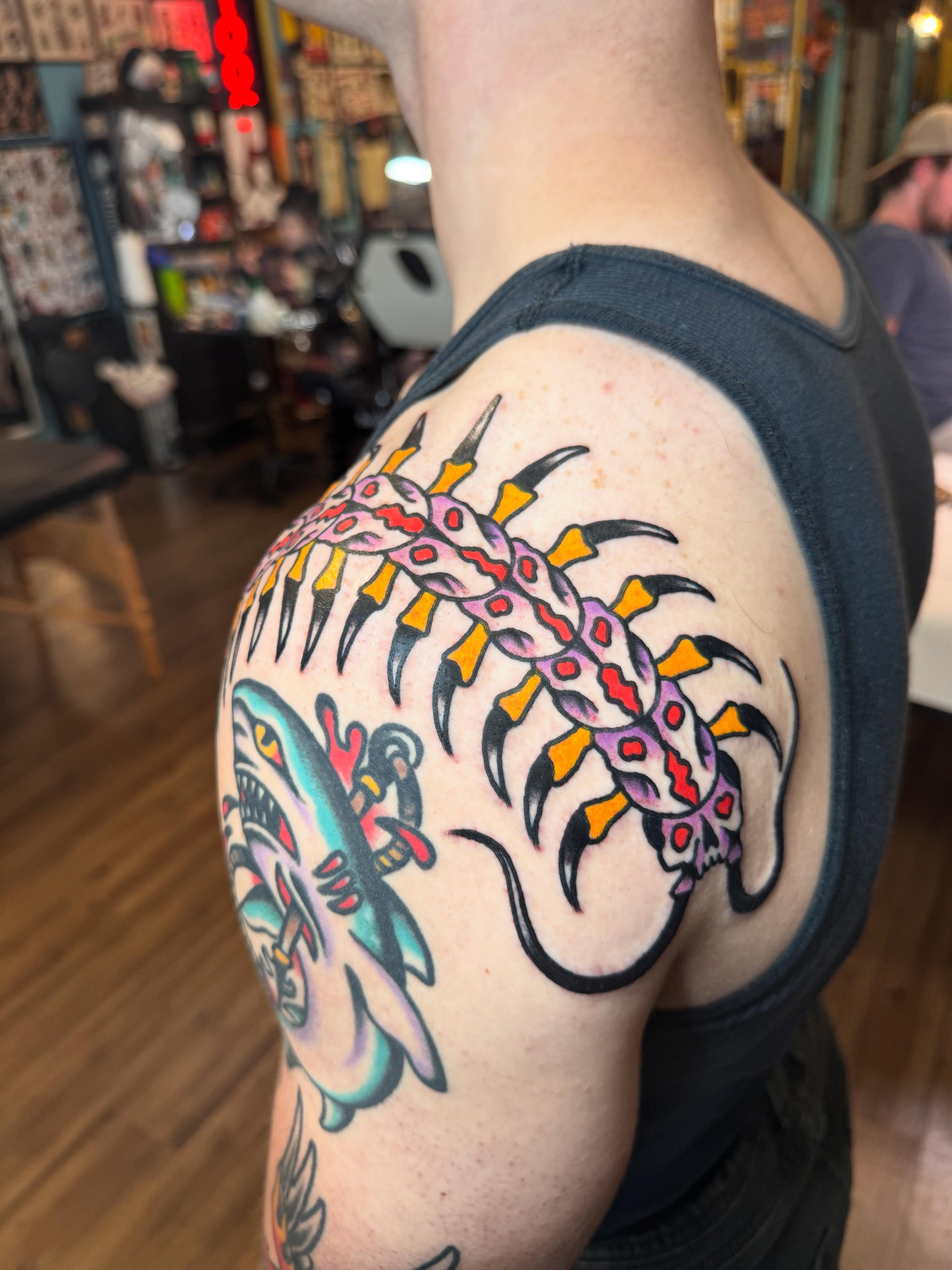 Centipede American traditional tattoo on the shoulder by Jonathan Clapp, San Antonio, Texas