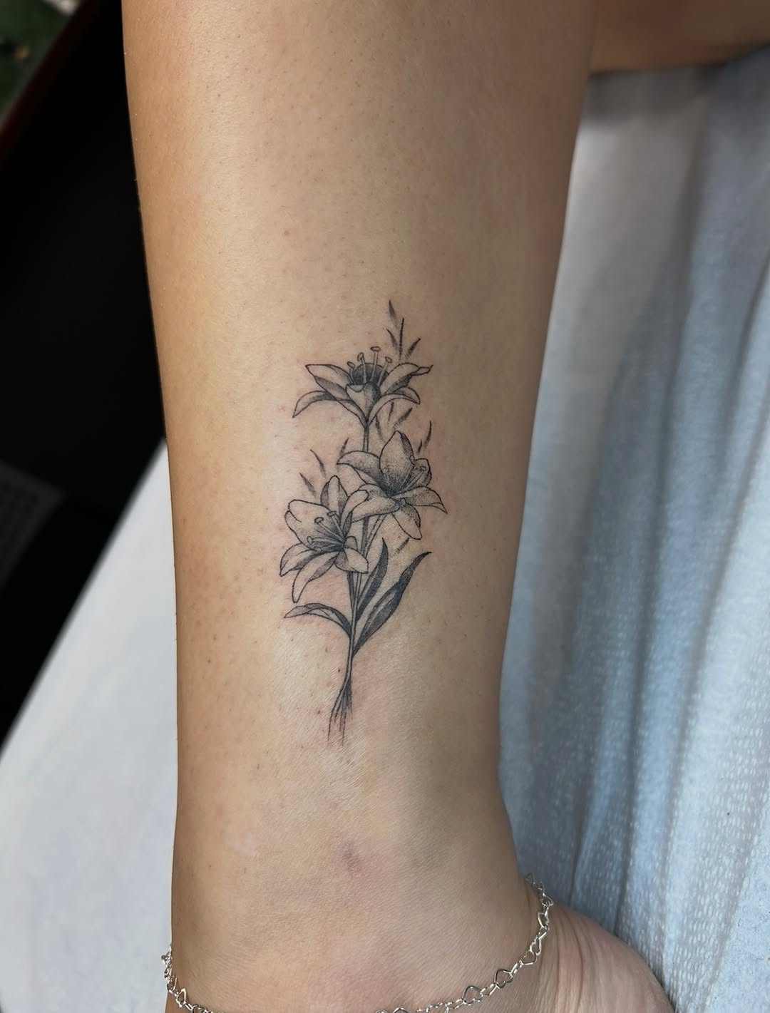 Tattoo by @saber_tooth_tattoo — fine_line, black_and_grey