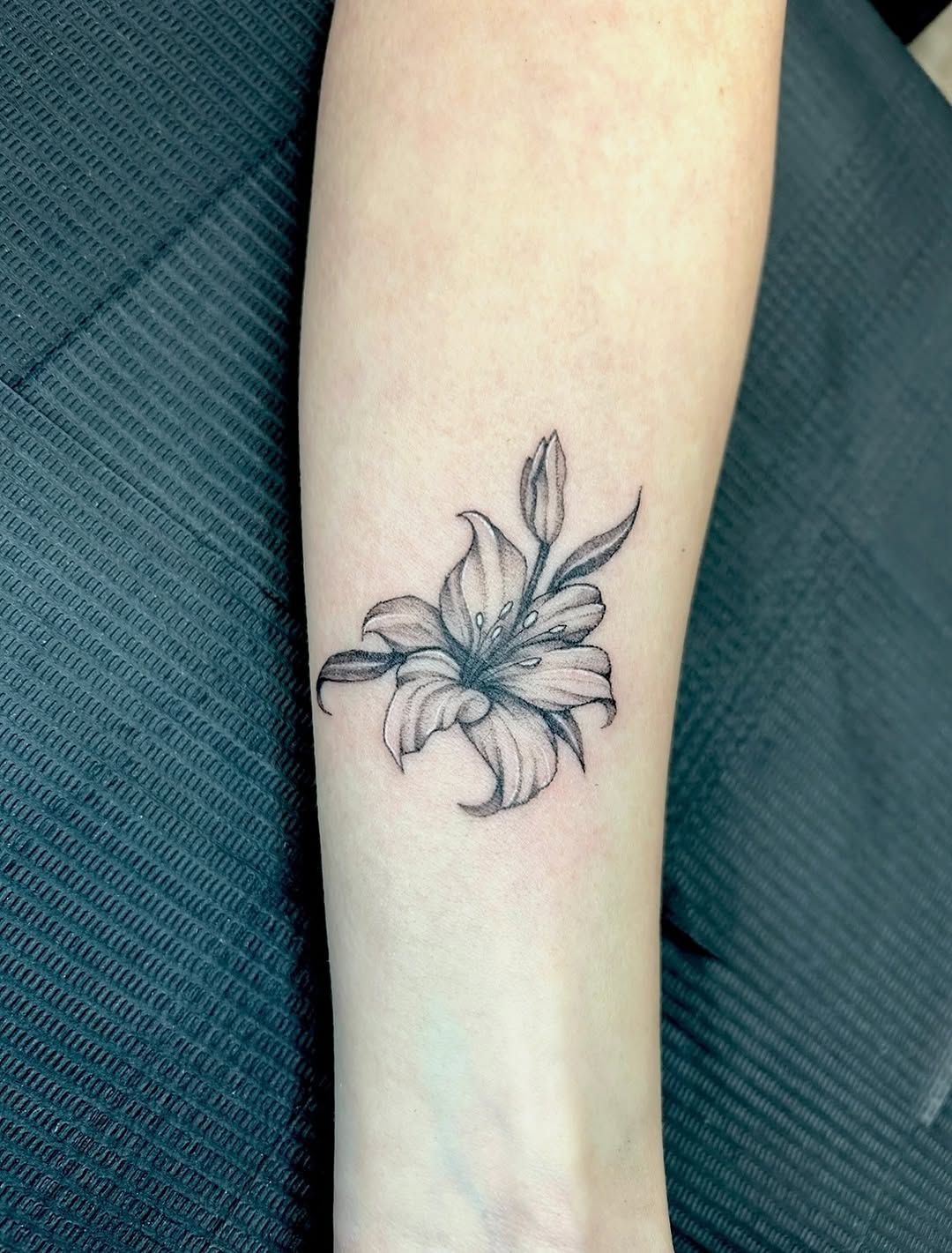 Tattoo by @saber_tooth_tattoo — black_and_grey, realism